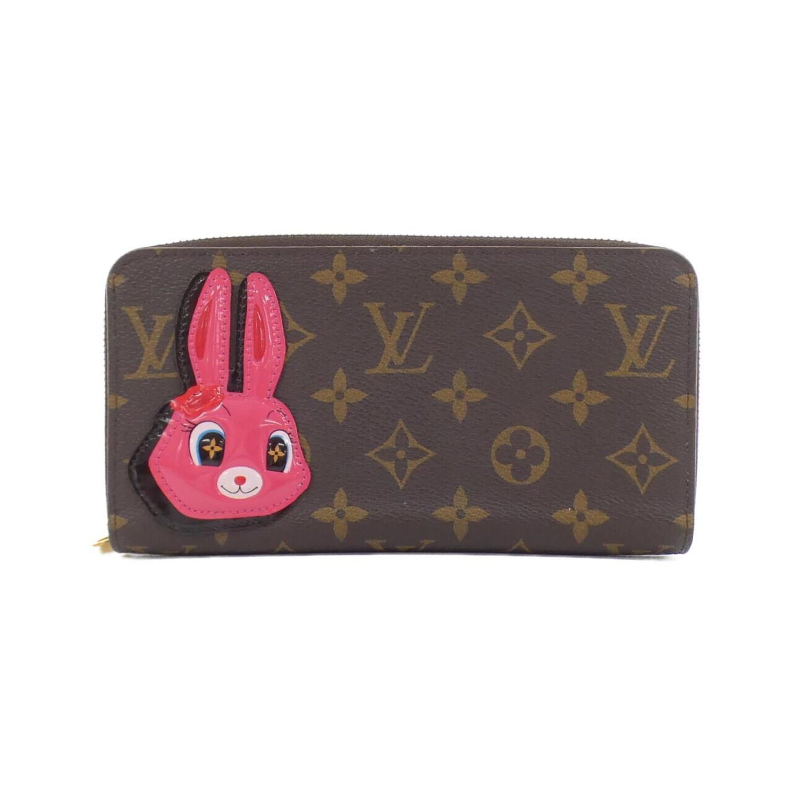 Long Wallet Bi fold Coated Canvas by Louis Vuitton: Long Wallet Bi fold Coated Canvas by Louis Vuitton Marron coated canvas, the signature style of Louis Vuitton, adorns this long wallet in bi-fold design. Measuring 10cm x 19cm x 2cm, it comes with a d