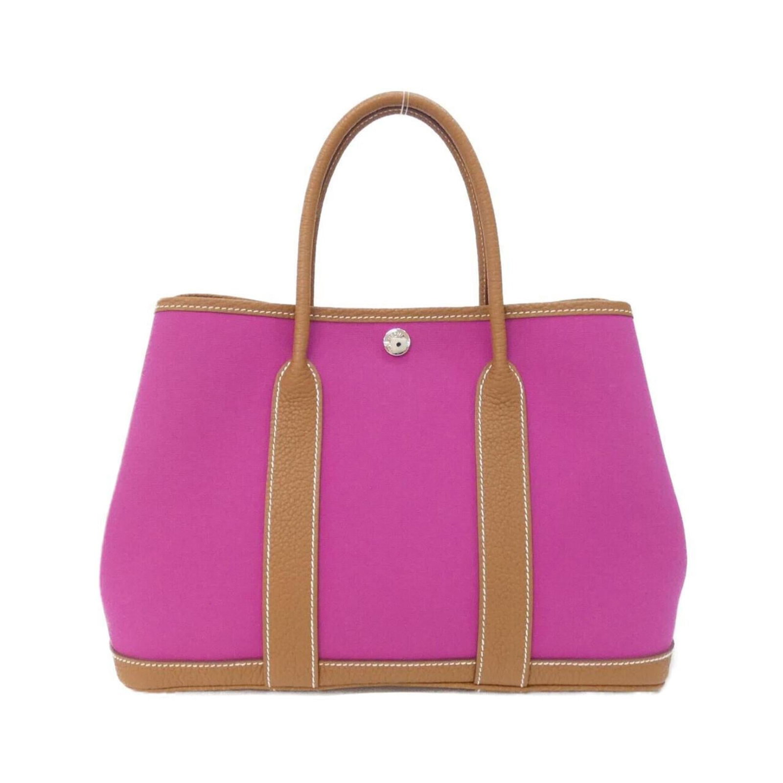 Hermes Handbag Toile Officier Negonda Leather: Hermes Handbag Toile Officier Negonda Leather Toile Officier Negonda Leather Handbag from Hermes, featuring gold and pink accents in silver hardware. This elegant handbag boasts a unique combination o
