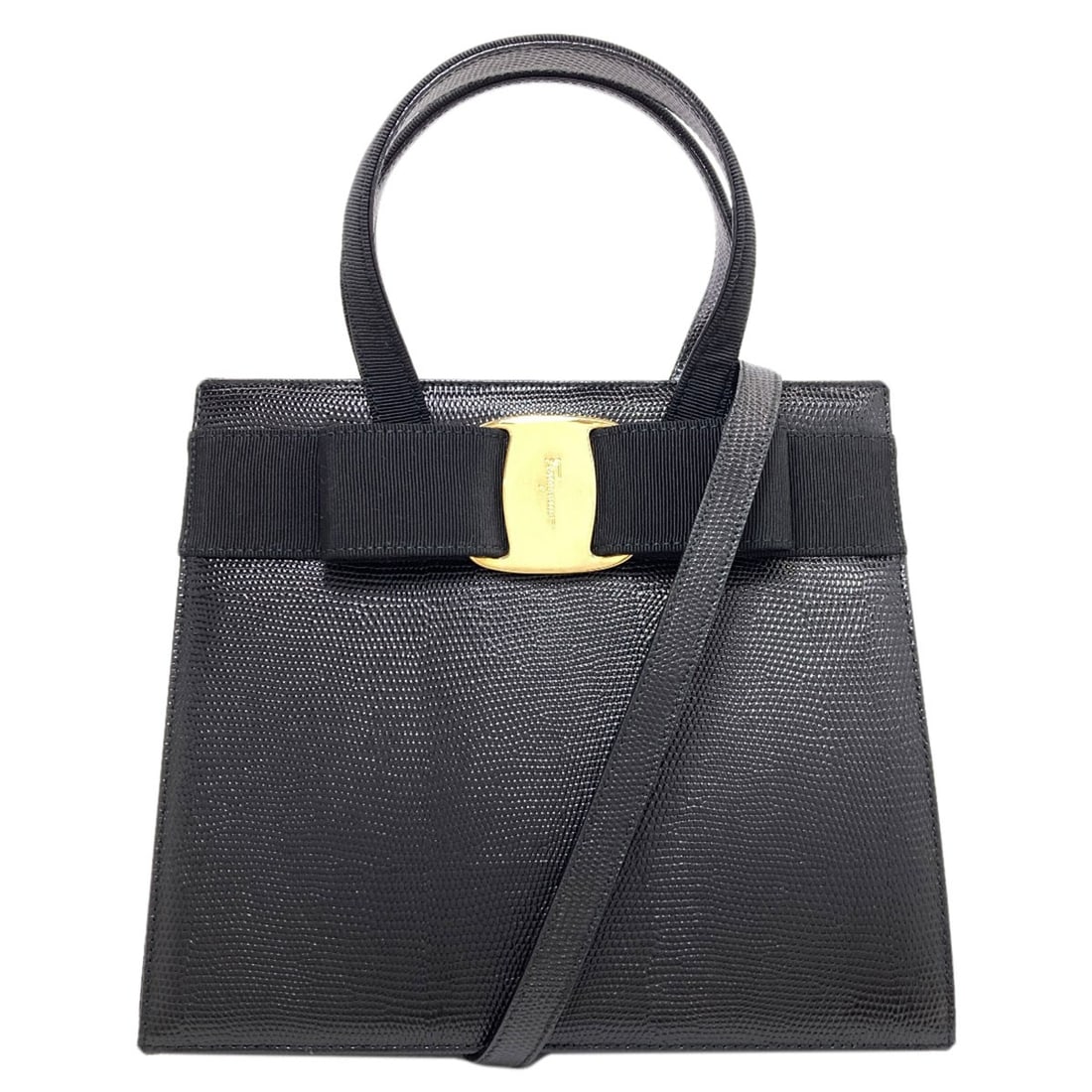 Salvatore Ferragamo Vara Ribbon Embossed 2-Way Bag Handbag Leather: Salvatore Ferragamo Vara Ribbon Embossed 2-Way Bag Handbag Leather The Salvatore Ferragamo Vara Ribbon Embossed 2-Way Bag is a sleek and sophisticated black leather handbag. Notable for its ribbon emb