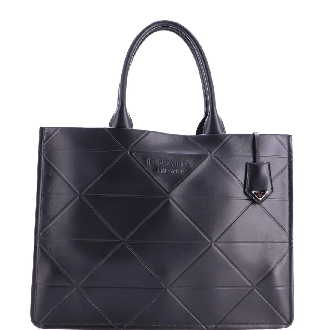 Symbole Shopper Embossed Leather Large Prada Tote: Symbole Shopper Embossed Leather Large Prada Tote Symbole Shopper Embossed Leather Large Prada Tote features an embossed leather exterior in black, with minor creases and minor scratches on the hardwa
