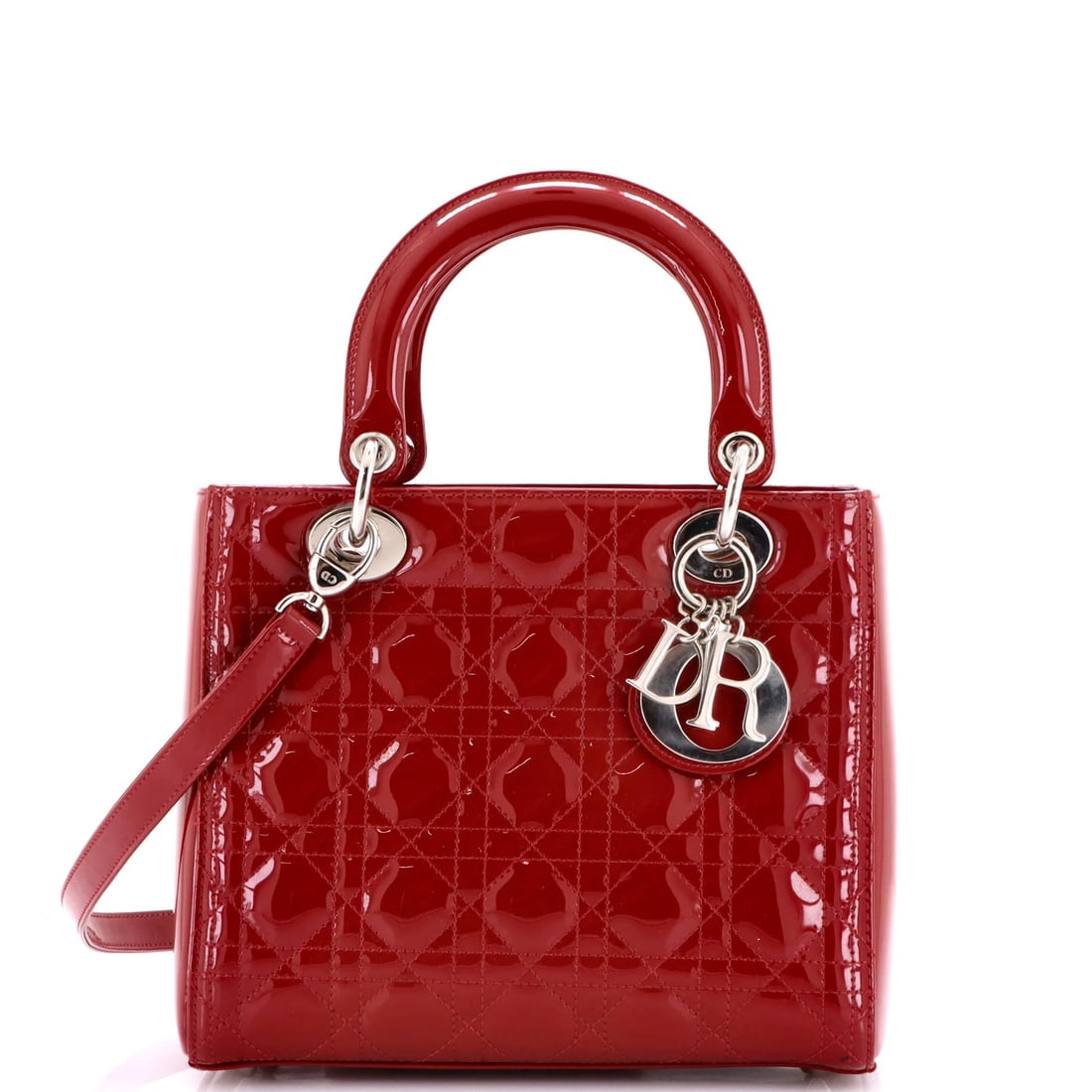 Patent quilt cannage medium lady bag Dior Christian: Patent quilt cannage medium lady bag Dior Christian Patent leather exterior, red in color, adds a touch of sophistication to this medium Lady Dior bag. The quilted cannage design provides a unique and