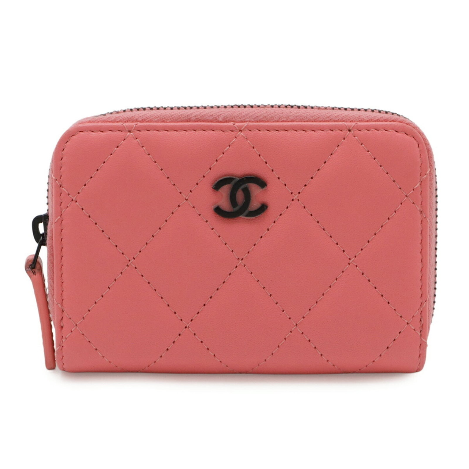 Chanel Coin Purse/ Coin Case Leather: Chanel Coin Purse/ Coin Case Leather Coral pink leather coin purse/coin case from the iconic Chanel Matelasse line, featuring a classic zipper closure and a compact size that fits perfectly in a pocke