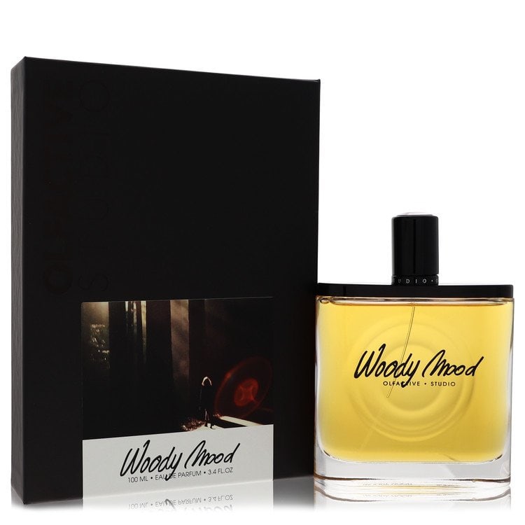 Woody Mood by Olfactive Studio Eau De Parfum Spray (Unisex) 3.4 oz: Woody Mood by Olfactive Studio Eau De Parfum Spray (Unisex) 3.4 oz Woody Mood by Olfactive Studio Eau De Parfum Spray (Unisex) 3.4 oz features an exotic, earthy blend with notes of bergamot, ginger, c