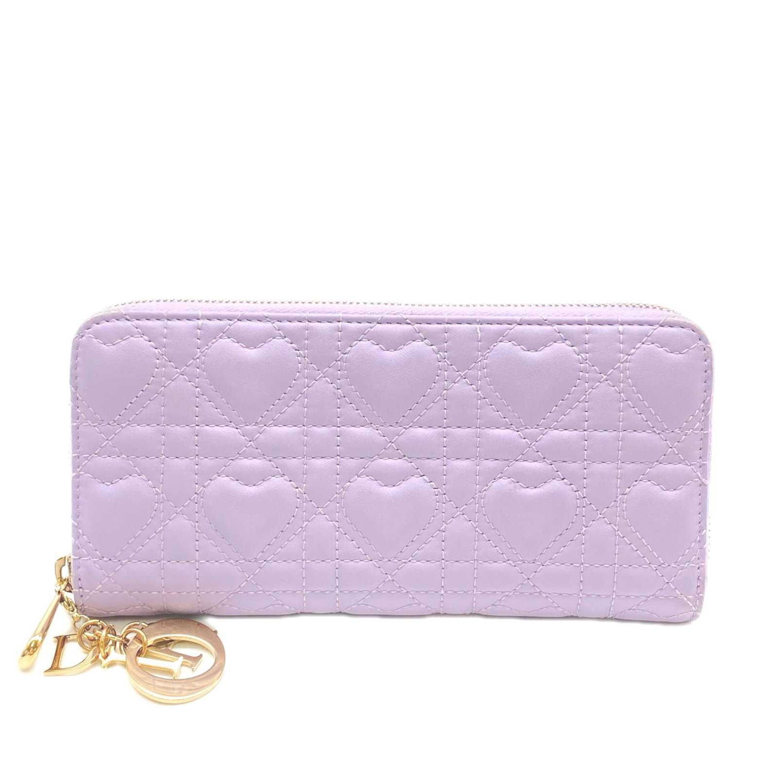 Christian Dior Long Wallet (Bi-Fold) Leather: Christian Dior Long Wallet (Bi-Fold) Leather The Christian Dior Long Wallet in Lambskin Purple features a sleek bi-fold design with a zipper closure, perfect for everyday carry. Made from high-quality