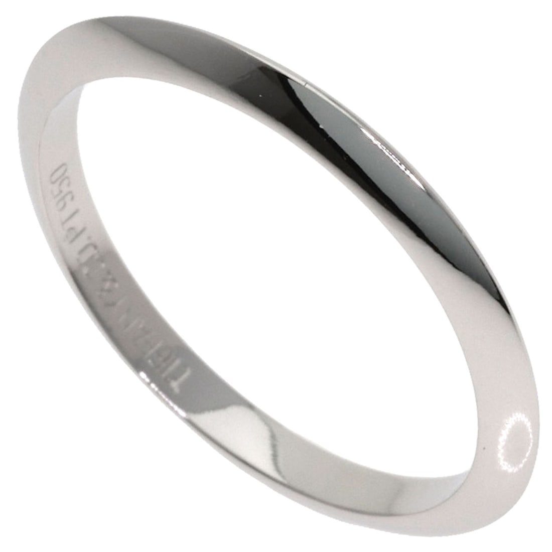 Knife Edge Ring Of Tiffany Co Platinum: Knife Edge Ring Of Tiffany Co Platinum PT950 platinum provides a unique silver tone to this Tiffany & Co. ring, giving it a distinctive appearance. The ring's design features a knife edge profile, add