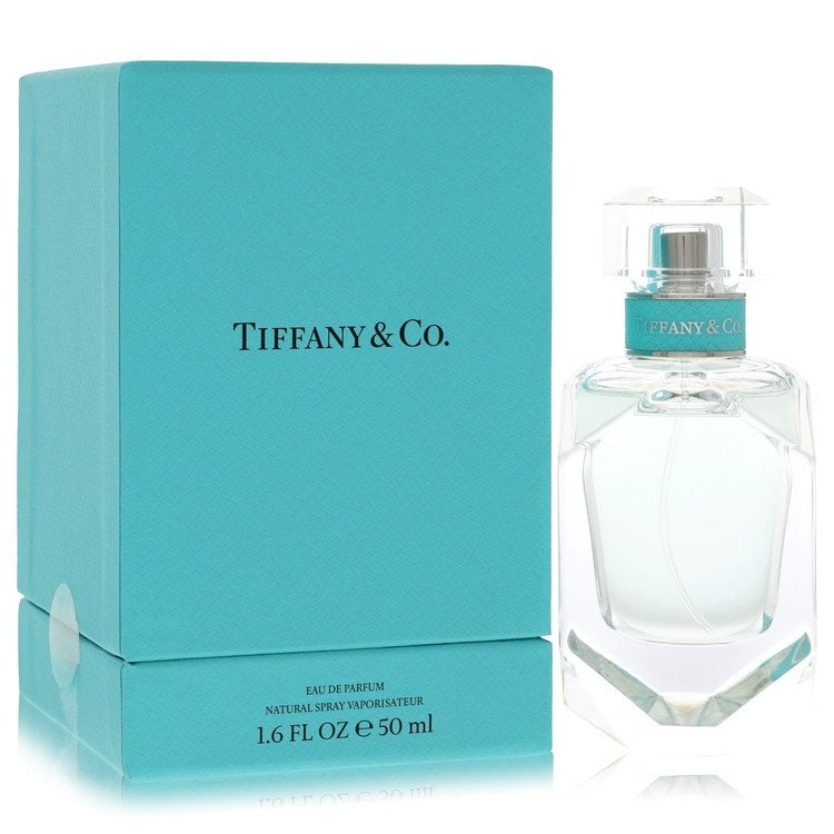 Tiffany by Tiffany Eau De Parfum Spray 1.7 oz: Tiffany by Tiffany Eau De Parfum Spray 1.7 oz Tiffany by Tiffany Eau De Parfum Spray is an elegant and luxurious fragrance for women, featuring a gorgeous blend of jasmine, orange, iris, and rose. Int