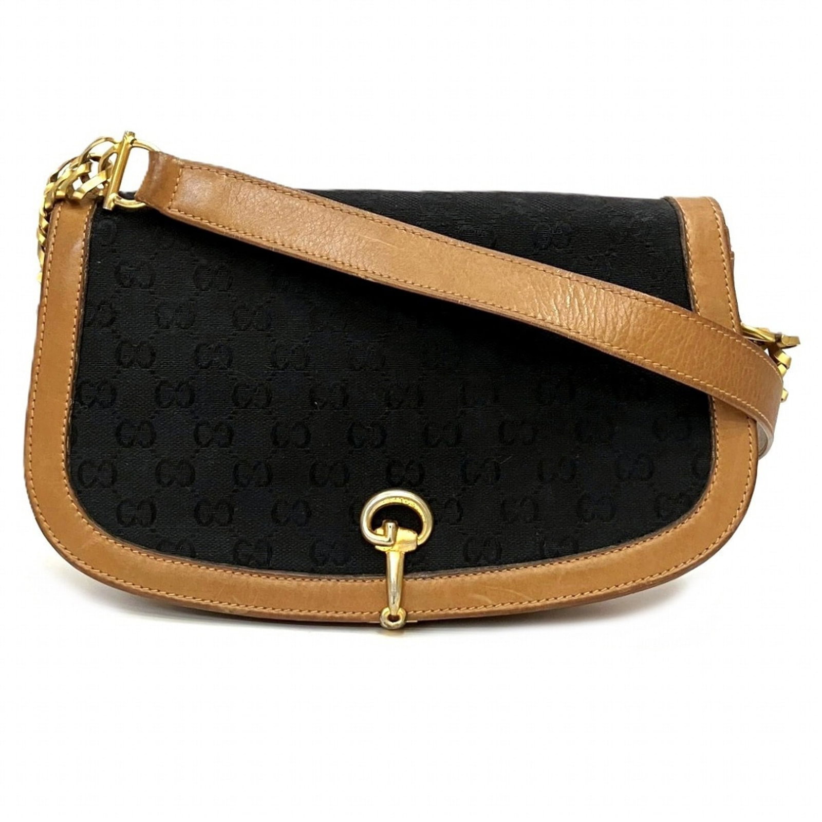 Canvas leather shoulder bag from Gucci: Canvas leather shoulder bag from Gucci Canvas leather shoulder bag from Gucci, featuring the iconic Horsebit detail in rich brown color. This stylish and versatile bag measures 15.5cm x 25cm x 8cm, ma