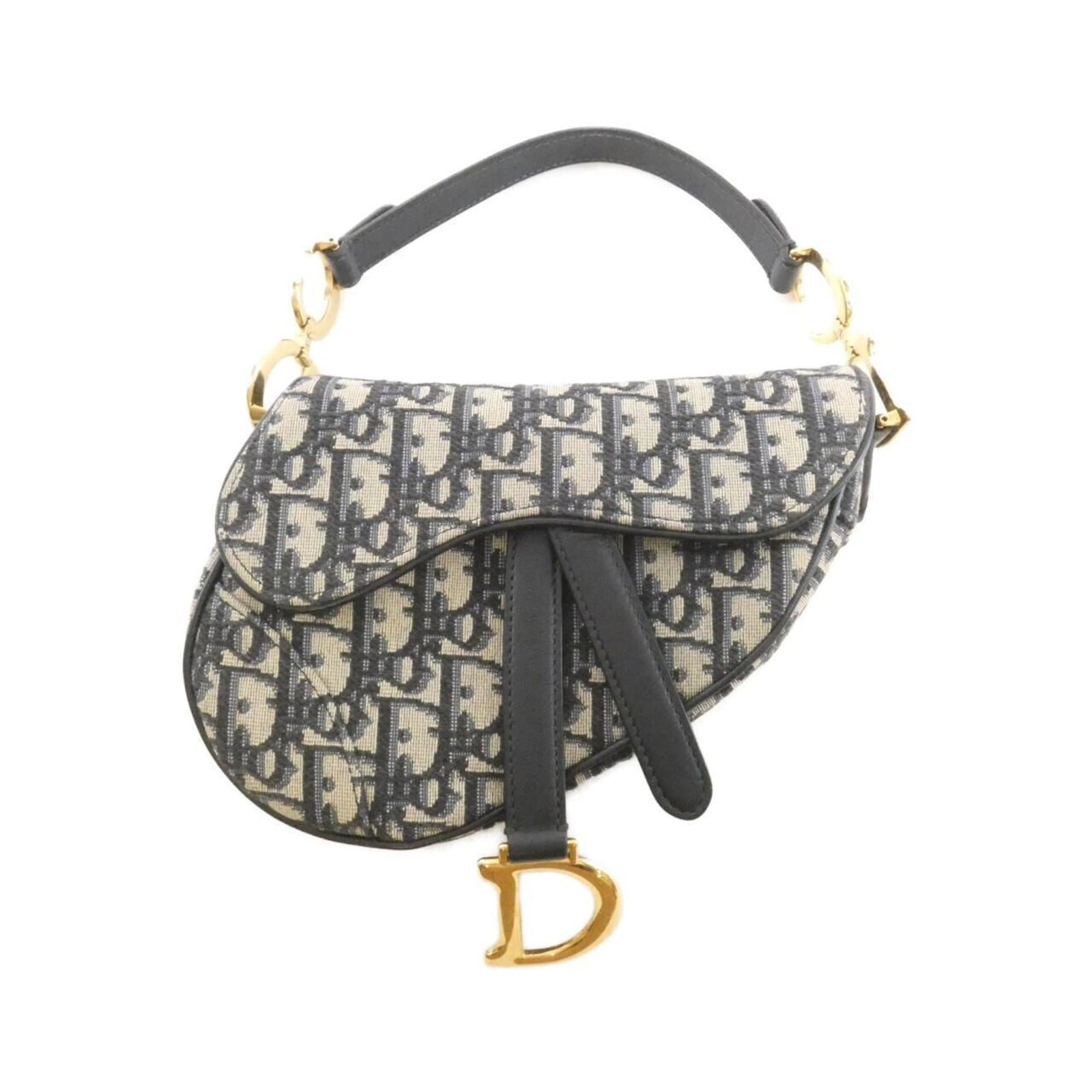 Handbag Christian Dior Canvas: Handbag Christian Dior Canvas Canvas Handbag from Christian Dior, featuring a blue canvas material and gold hardware. This compact bag measures 15cm x 20cm x 5cm, making it a stylish and portable acce