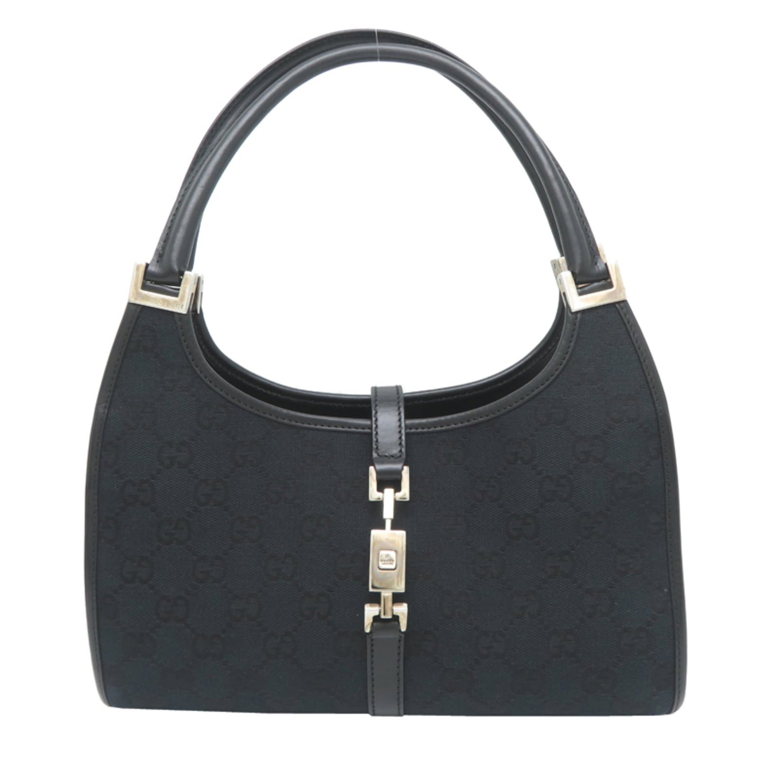 Gucci canvas handbag: Gucci canvas handbag Gucci canvas handbag in black, featuring the iconic GG canvas material. Measuring 21cm x 26cm x 8cm, it's a stylish and compact accessory for everyday use. Made with high-quality 