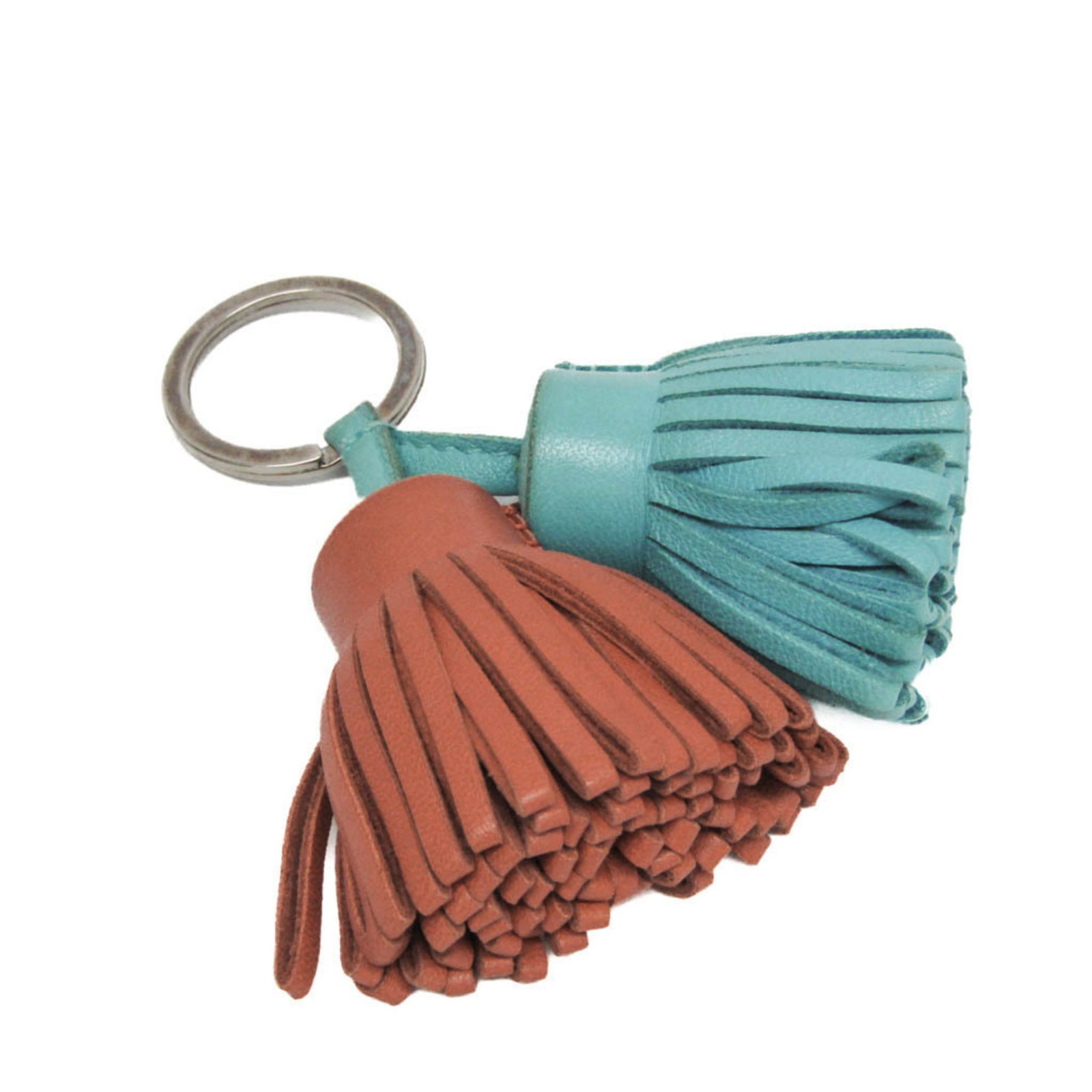 Keyring Agneau Hermes Milo: Keyring Agneau Hermes Milo Agneau Milo keyring from Hermes, crafted in France with Light blue and Orange hues. This stylish accessory features the Uno Dos design on a durable Agneau Milo material, mea