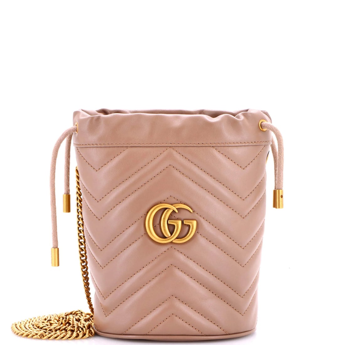 Matelasse leather mini bucket bag by Gucci GG Marmont: Matelasse leather mini bucket bag by Gucci GG Marmont The Gucci GG Marmont Matelasse Leather Mini Bucket Bag boasts a neutral exterior with subtle scuffs and edge wear, adding to its understated charm