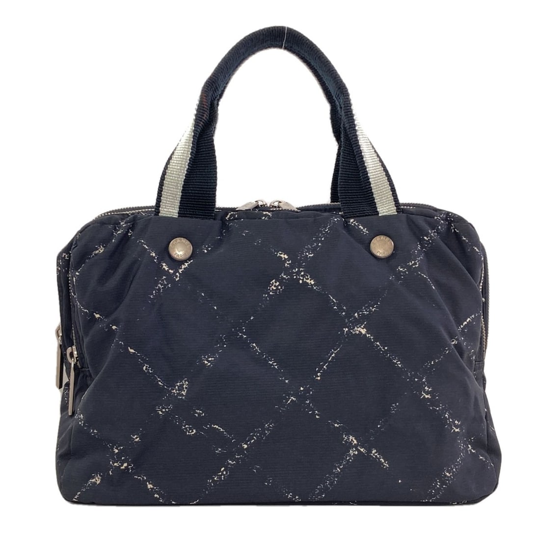 Handbag Nylon Chanel Travel: Handbag Nylon Chanel Travel Black Chanel Travel Handbag made from Nylon. This handbag features a classic design with a black exterior, making it a stylish and versatile accessory for everyday use. The