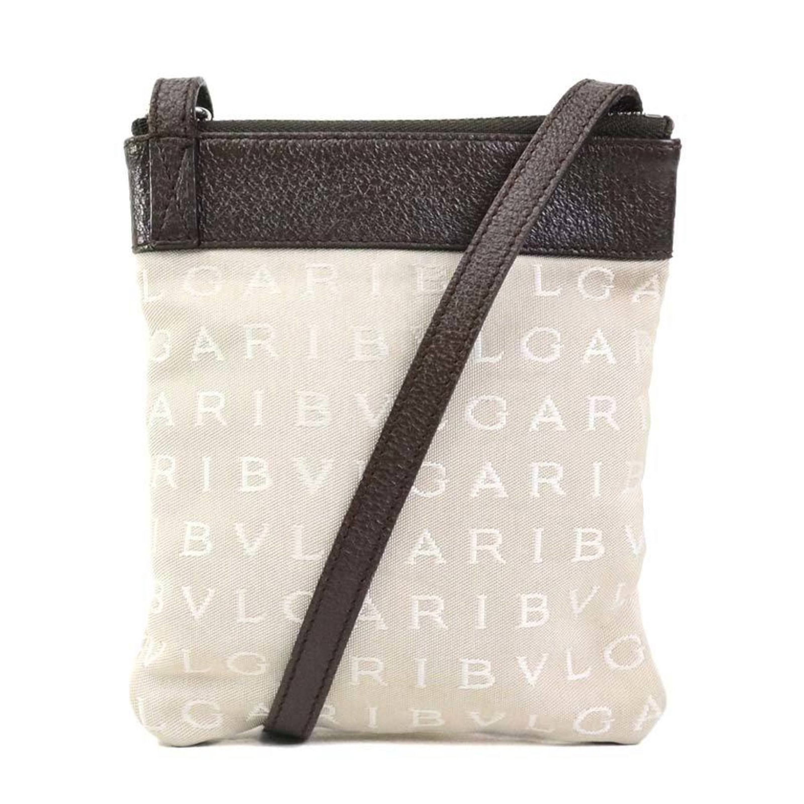 Shoulder bag nylon leather canvas by Bvlgari: Shoulder bag nylon leather canvas by Bvlgari Bvlgari's nylon leather canvas shoulder bag boasts a classic design with a timeless beige and brown color combination. Measuring 17cm x 14cm, this versatil