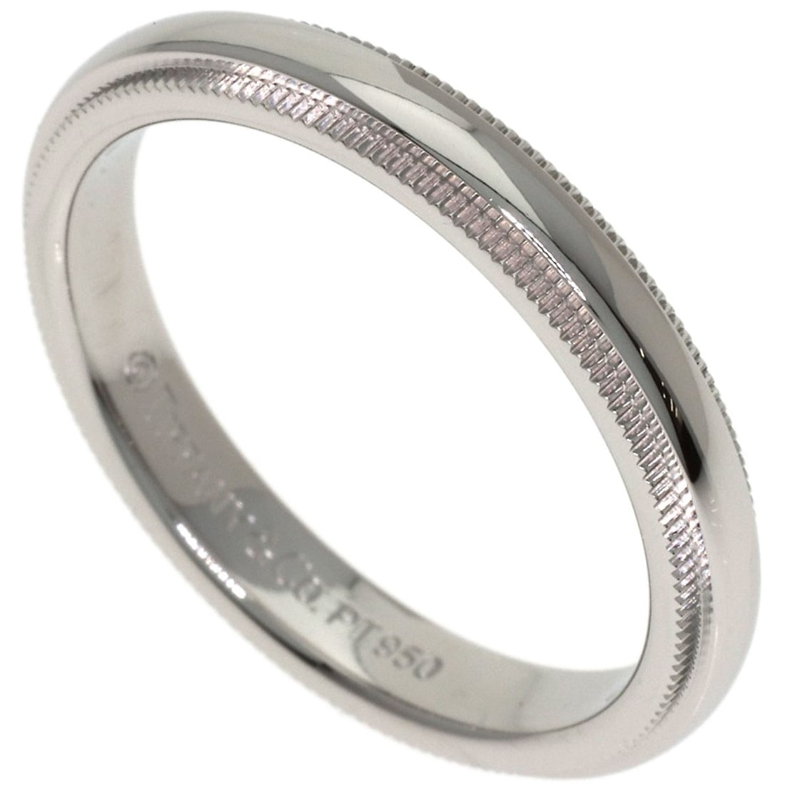 Tiffany and Co Milgrain Ring in Platinum: Tiffany and Co Milgrain Ring in Platinum Platinum Milgrain Ring from Tiffany & Co. features intricate milgrain details, showcasing the brand's signature craftsmanship. This silver-plated platinum