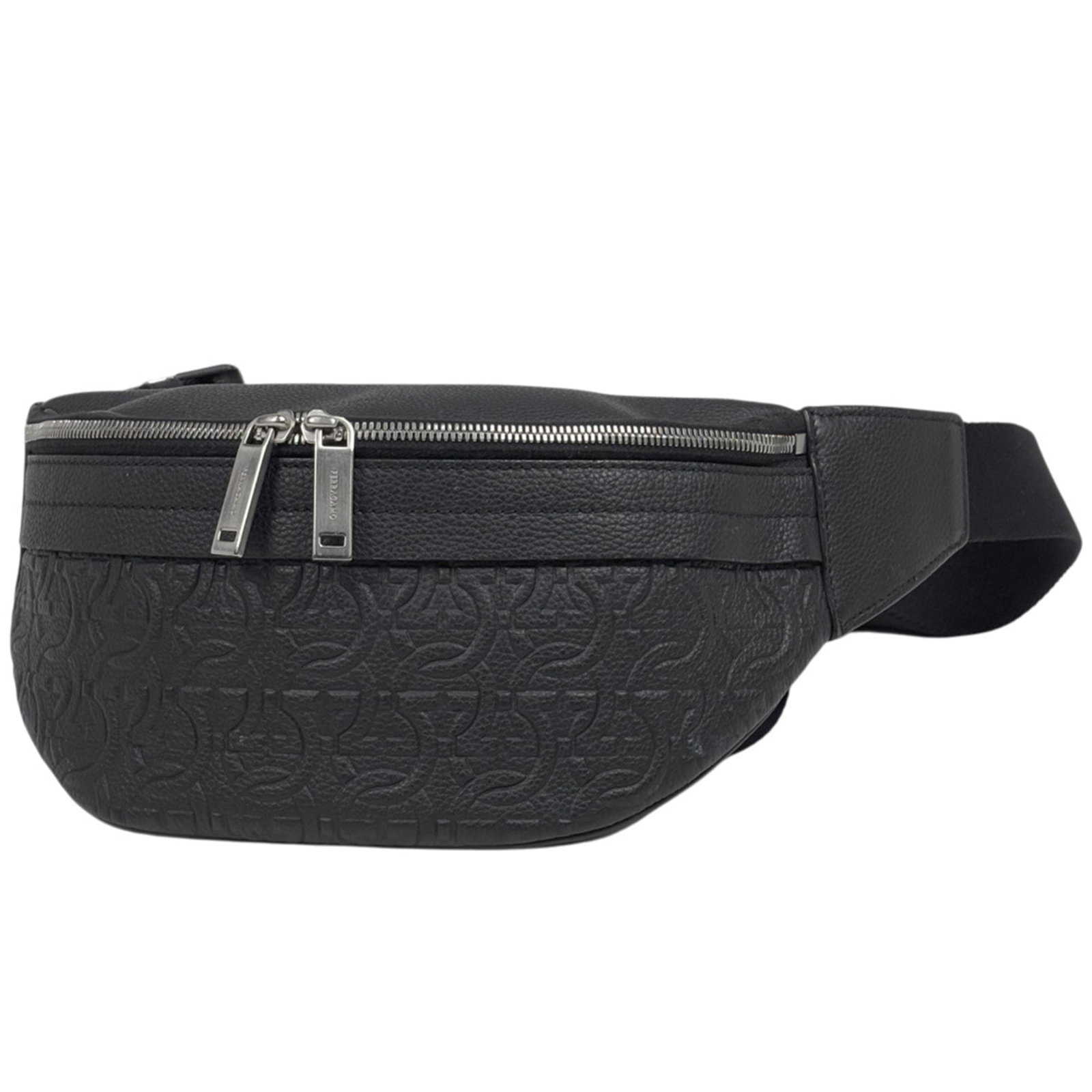 Salvatore Ferragamo Fanny Sling Leather Pack: Salvatore Ferragamo Fanny Sling Leather Pack Salvatore Ferragamo's sleek and sophisticated Fanny Sling Leather Pack is a stylish accessory for the modern woman. Made from high-quality leather, this bl