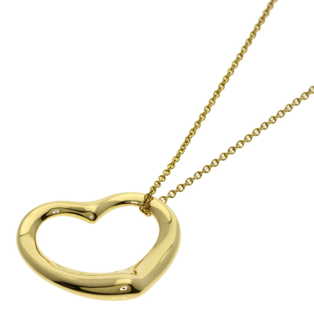 Yellow gold necklace open heart Tiffany Co: Yellow gold necklace open heart Tiffany Co K18 yellow gold necklace with an open heart design, crafted by Tiffany & Co. in a striking gold hue. This elegant piece boasts a length of 16.1 inches, showc
