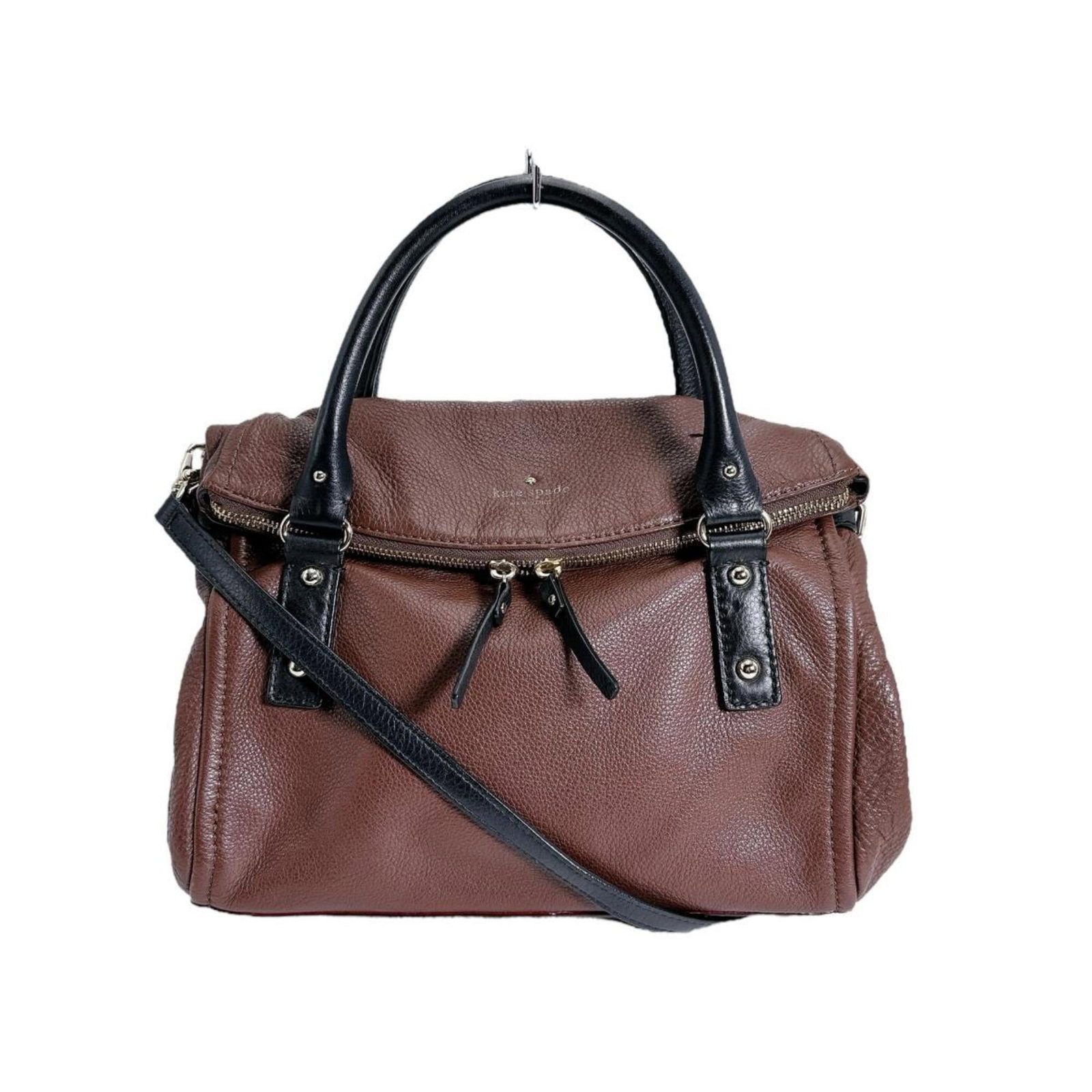 Handbag leather Kate: Handbag leather Kate Brown leather Kate Spade handbag with shoulder strap, measuring 24cm x 29cm x 9cm. This stylish bag features high-quality leather material and a classic design that makes it a ver