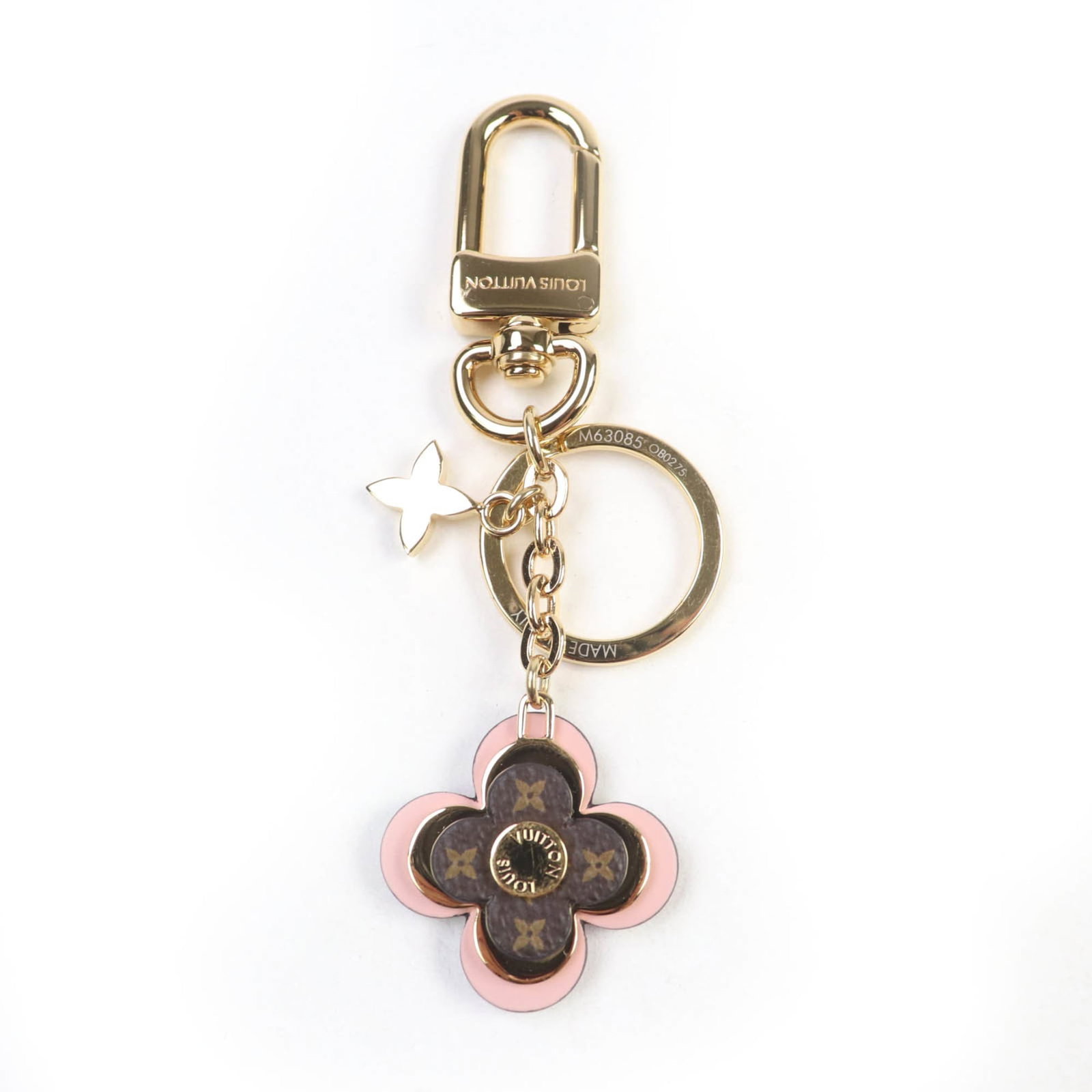 Keyring by Louis Vuitton: Keyring by Louis Vuitton Brown, Gold, Pink Louis Vuitton Keyring. This elegant keyring from the iconic French fashion house features a classic design with a durable construction. Comes in its original