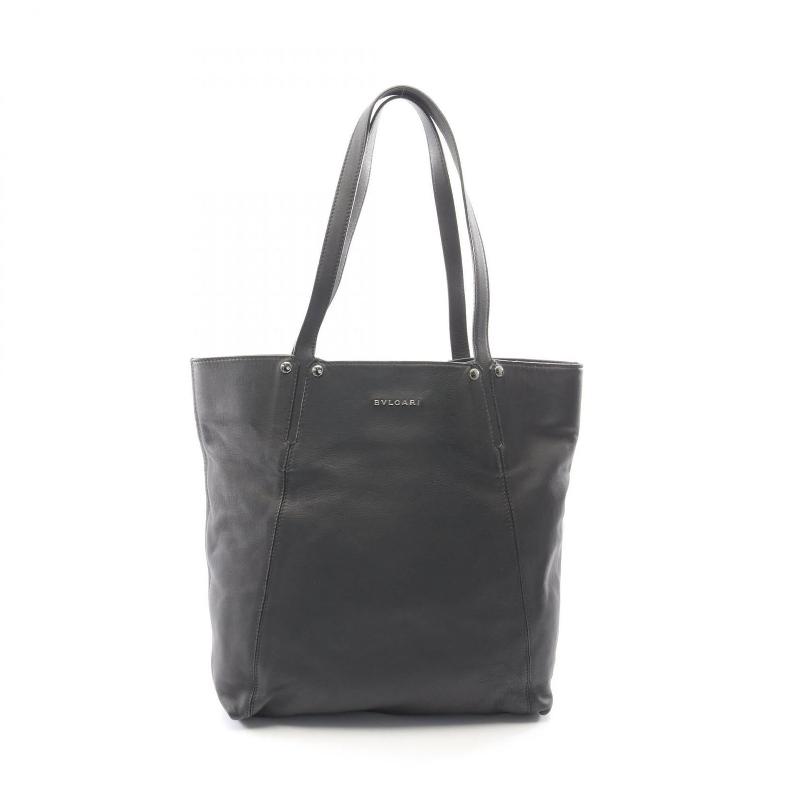 Handbag tote leather bag Bvlgari: Handbag tote leather bag Bvlgari Bvlgari leather tote bag in black, measuring 35cm x 32cm x 9cm. This stylish handbag features high-quality leather construction and a sleek design that makes it perfec