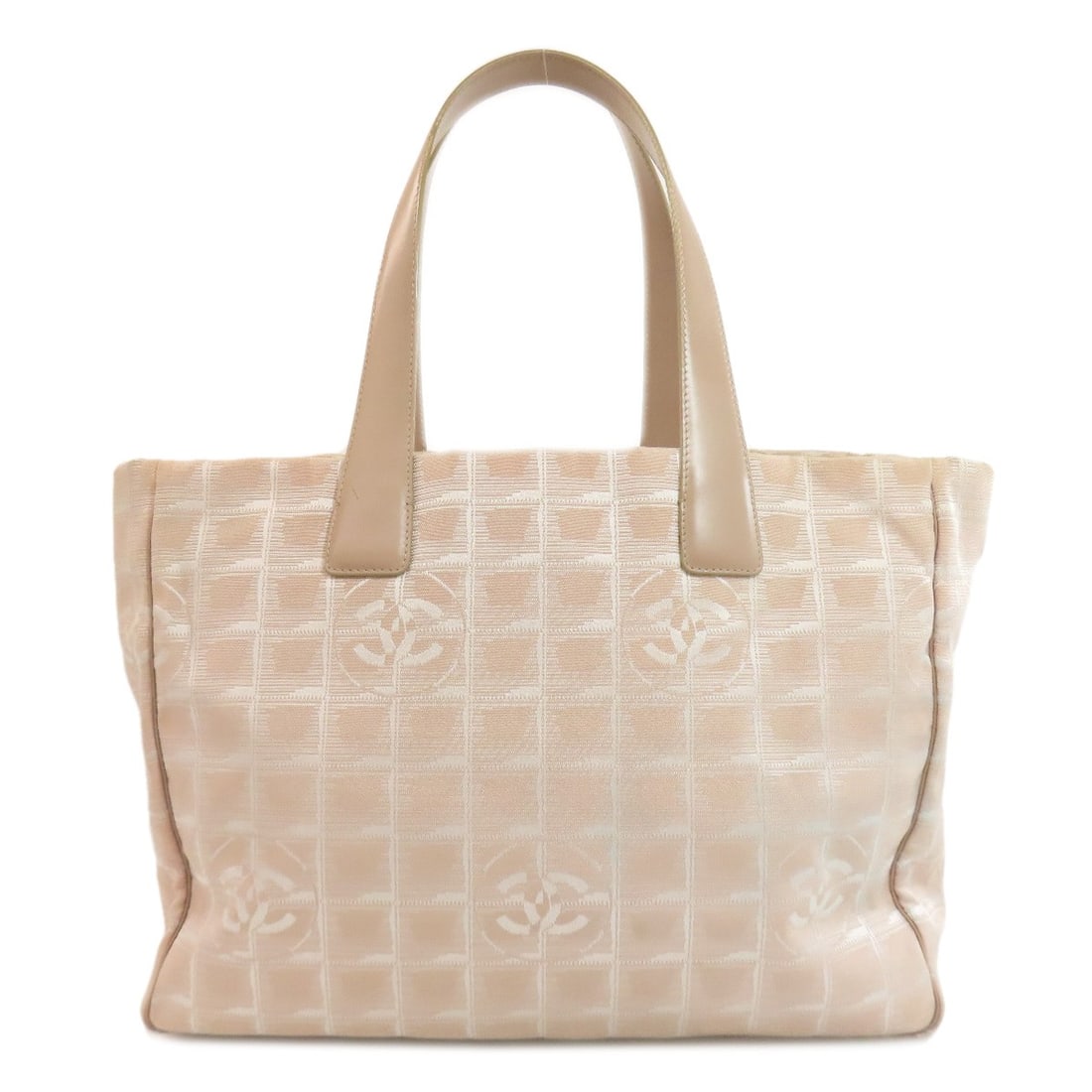 New travel line nylon tote bag by Chanel: New travel line nylon tote bag by Chanel Beige nylon jacquard tote bag by CHANEL, featuring the iconic brand's signature style and exterior color. Made from high-quality nylon, this tote bag boasts a 