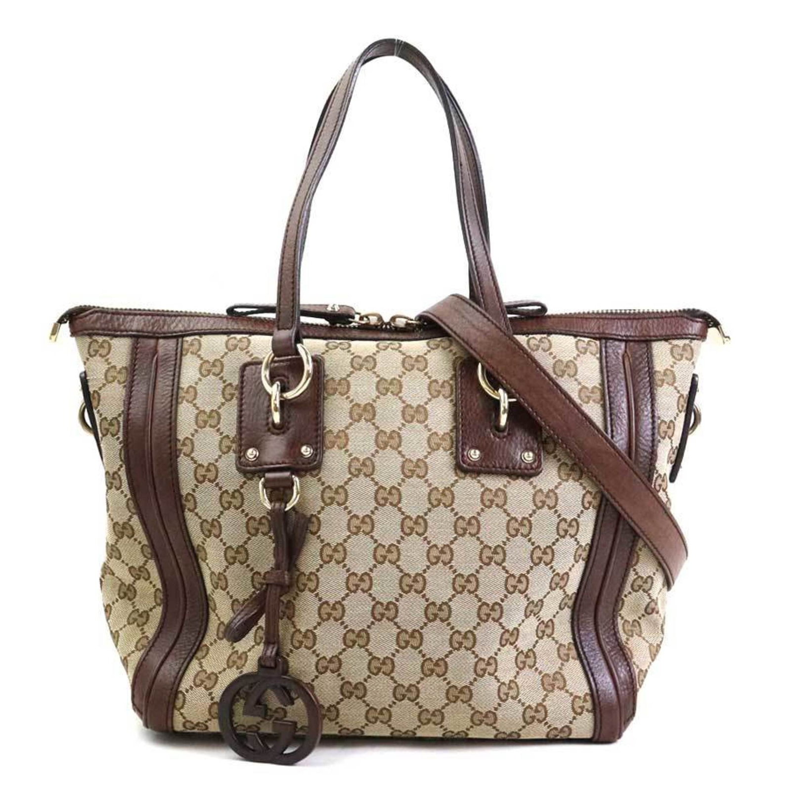 Shoulder bag canvas handbag Gucci: Shoulder bag canvas handbag Gucci Gucci canvas handbag in brown GG canvas, featuring a classic shoulder bag design with a dust bag and adjustable shoulder strap. This stylish accessory measures 26cm x
