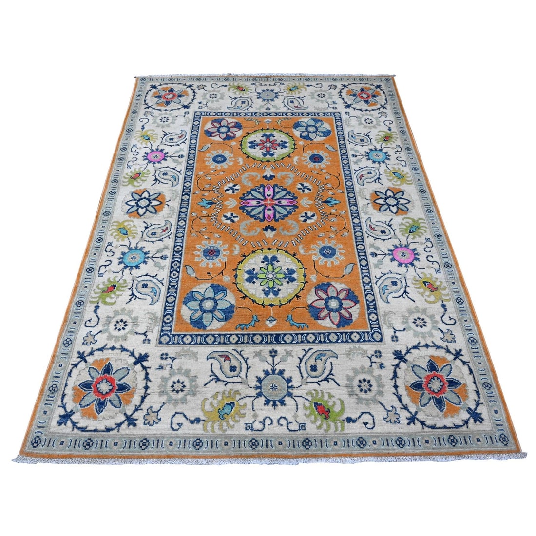 4'10"x6'8" Metallic Orange Pure Wool Colorful Fusion Kazak Oriental Rug: 4'10"x6'8" Metallic Orange Pure Wool Colorful Fusion Kazak Oriental Rug The vibrant Metallic Orange Pure Wool Colorful Fusion Kazak Oriental Rug boasts an impressive rectangular field with intricate h