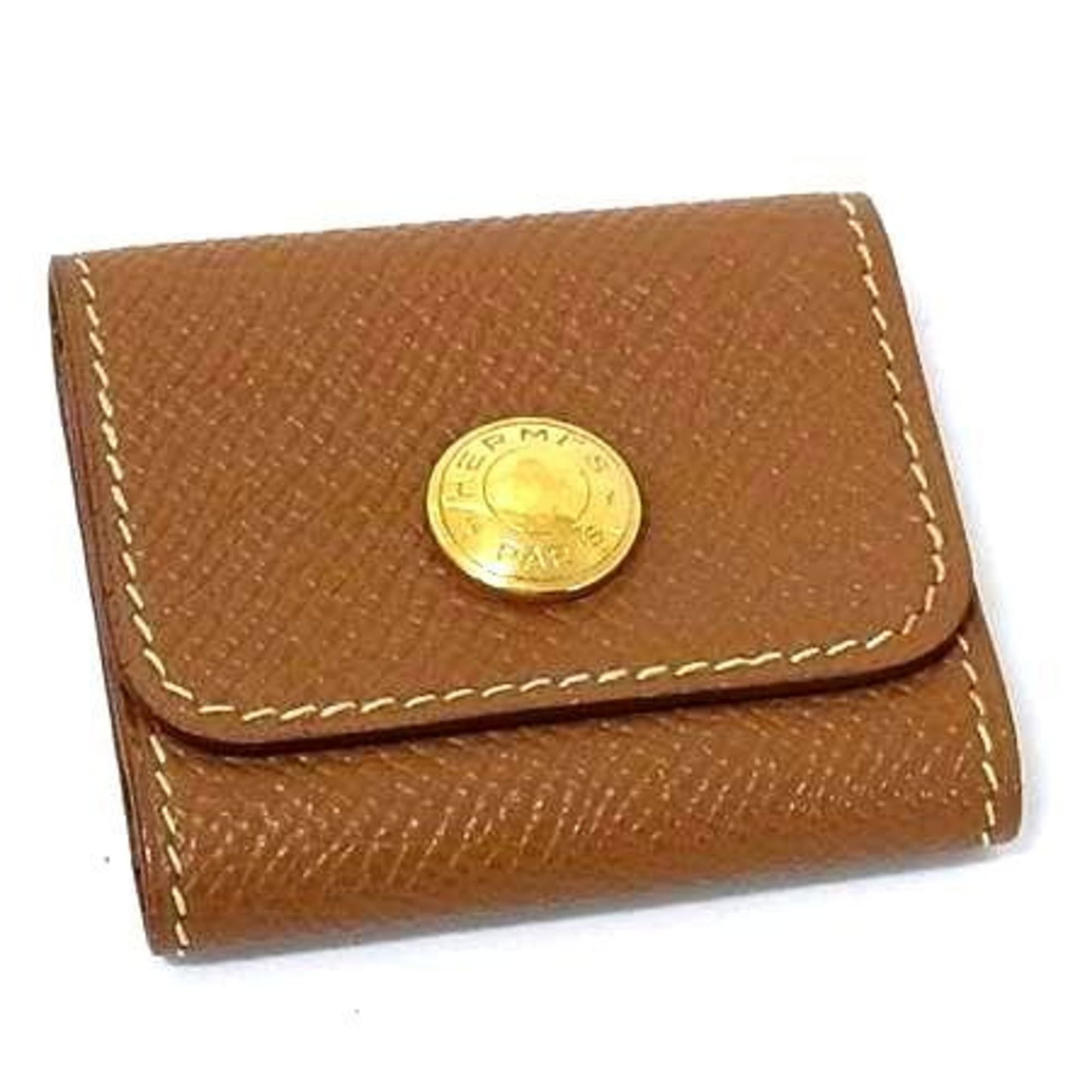 Epsom Leather Hermes: Epsom Leather Hermes Epsom Leather Epsom leather pouch from Hermes, made in France. This brown snap closure pouch measures 5cm x 5.5cm x 1cm and comes with no accessories. The work bears a signature. 