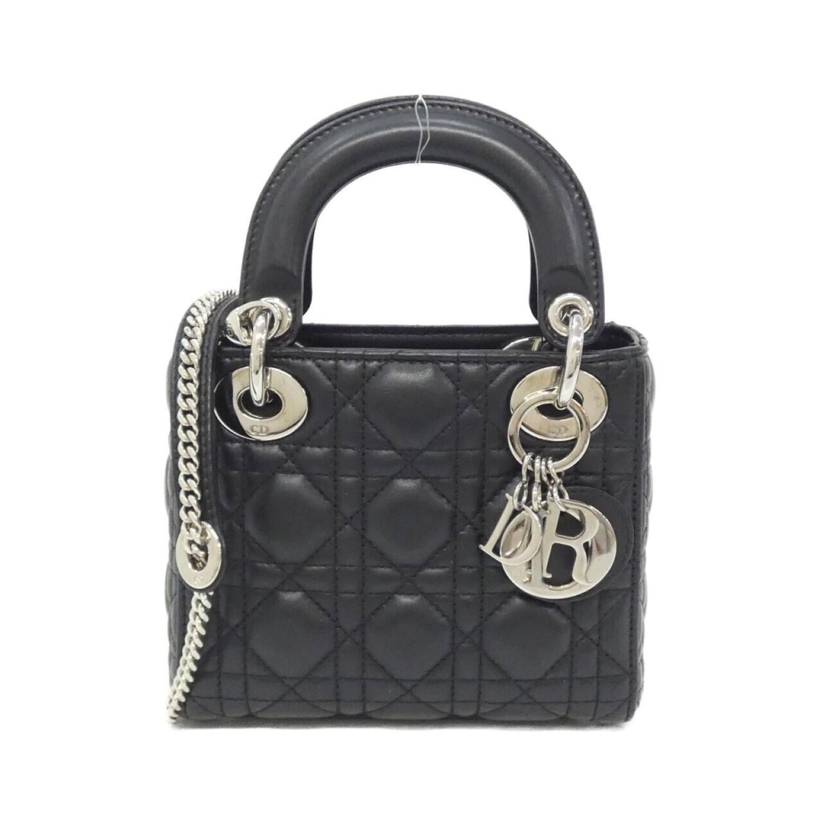Handbag Christian Dior Leather: Handbag Christian Dior Leather Handbag in black lambskin leather with classic design, measuring 15cm x 17cm x 7cm. Made from high-quality leather, this Christian Dior handbag features a timeless