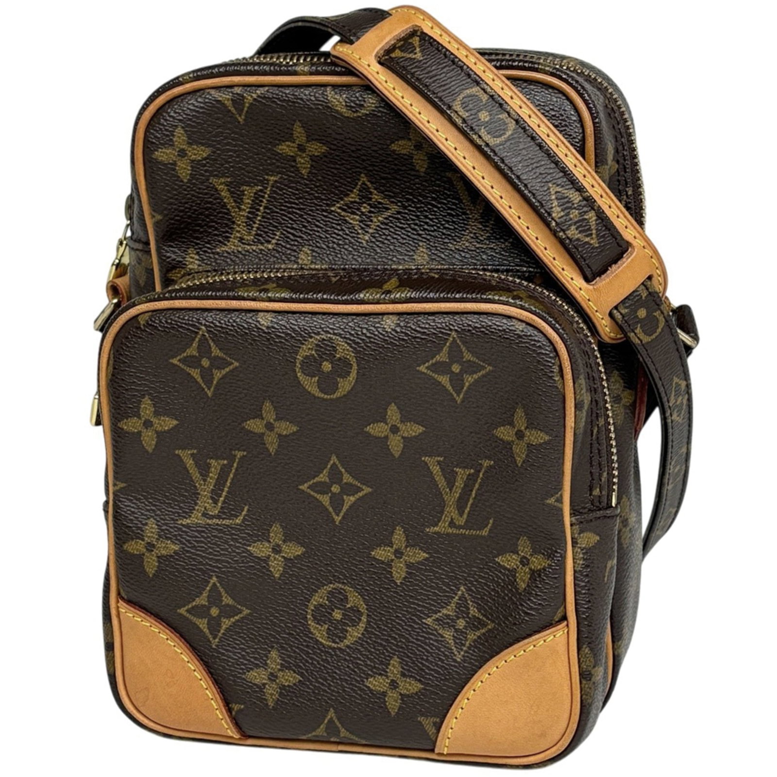 Monogram Louis Vuitton Shoulder Bag: Monogram Louis Vuitton Shoulder Bag The Monogram Louis Vuitton Shoulder Bag features the iconic monogram pattern in rich brown, adding a touch of timeless elegance to any outfit. With its compact size
