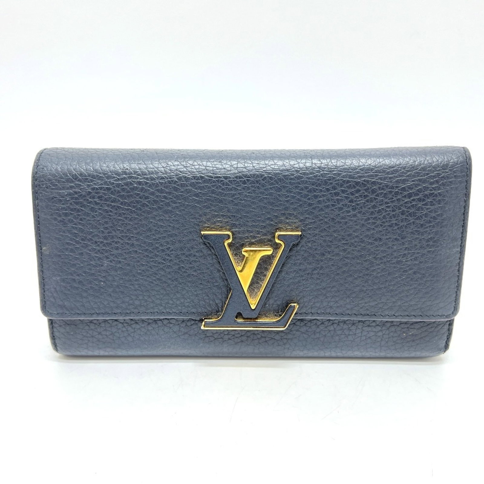 Long Wallet Bi Fold Leather Louis Vuitton: Long Wallet Bi Fold Leather Louis Vuitton Black, Noir Long Wallet Bi Fold Leather Louis Vuitton features a sleek design with a size of 10.5cm x 20cm x 2cm. Comes with a box and dust bag for added