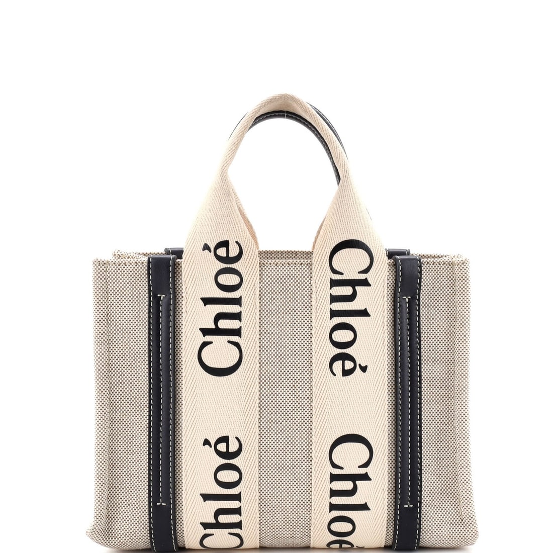 Chloe Woody Tote Canvas with Leather Small: Chloe Woody Tote Canvas with Leather Small Chloe's iconic Woody Tote Canvas with Leather Small offers effortless style and versatility. With its neutral exterior color, canvas construction, and sleek 