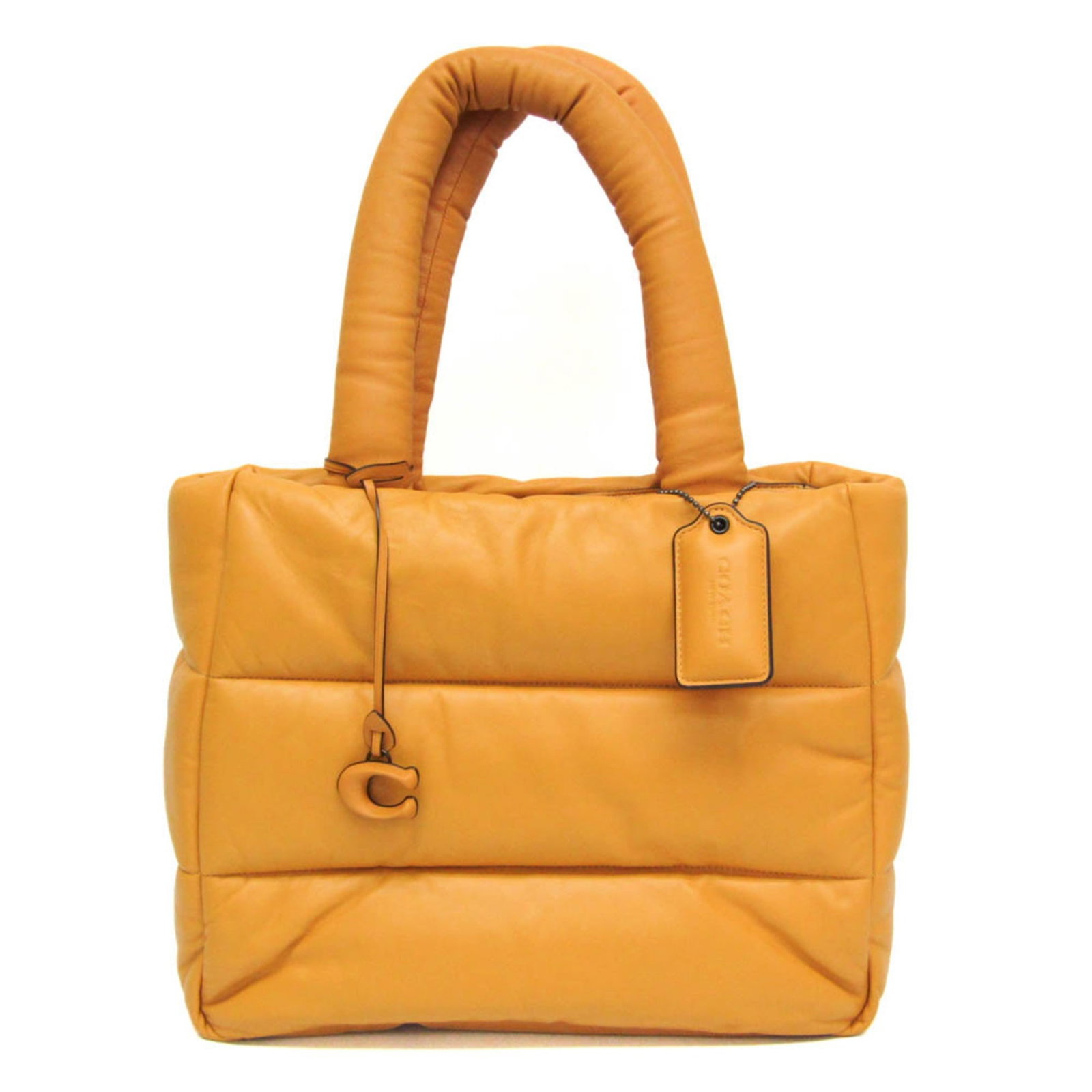 Leather tote bag by coach: Leather tote bag by coach Yellow Leather Tote Bag by Coach - A stylish and practical accessory, this pillow tote features a sleek yellow leather exterior with a secure zipper closure. The bag also boa