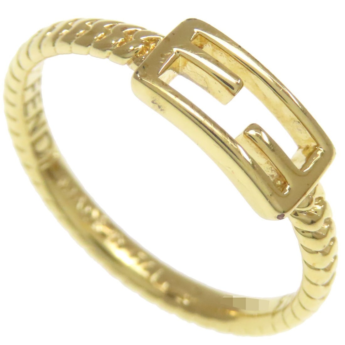 Metal ring baguette Fendi: Metal ring baguette Fendi Metal ring baguette Fendi, gold, size 5.5(US), bears a signature in gold. This metal ring features a distinctive design with a gold exterior color and ring shape. The item's 