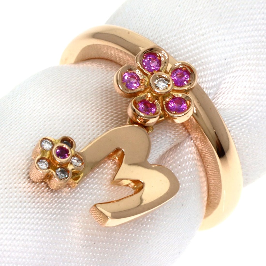 Ponte Vecchio Initial M Pink Sapphire Diamond Ring K18 Pink Gold: Ponte Vecchio Initial M Pink Sapphire Diamond Ring K18 Pink Gold K18 pink gold provides a luxurious backdrop for the striking pink sapphire and diamond combination, set in a sleek ring design. The tot