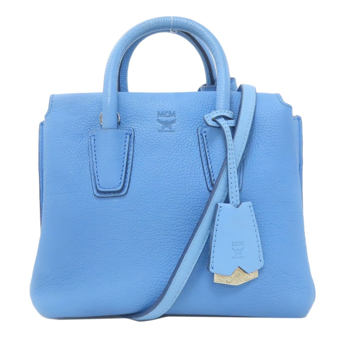 Mcm Leather Handbag 2way: Mcm Leather Handbag 2way Blue MCM Leather Handbag with Two-Way Closure. Made from high-quality leather, this stylish handbag features a sleek blue exterior and a durable two-way closure for easy