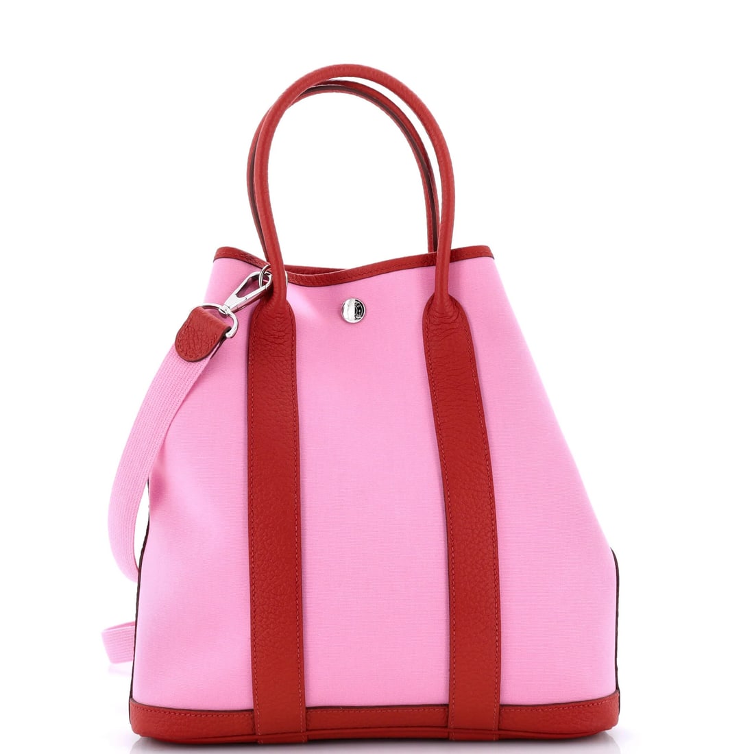 Toile Leather File Tote Garden Hermes 28: Toile Leather File Tote Garden Hermes 28 Pink Toile Leather File Tote from the iconic Garden collection by Hermes, boasting a classic canvas and leather exterior with a timeless design. The spacious