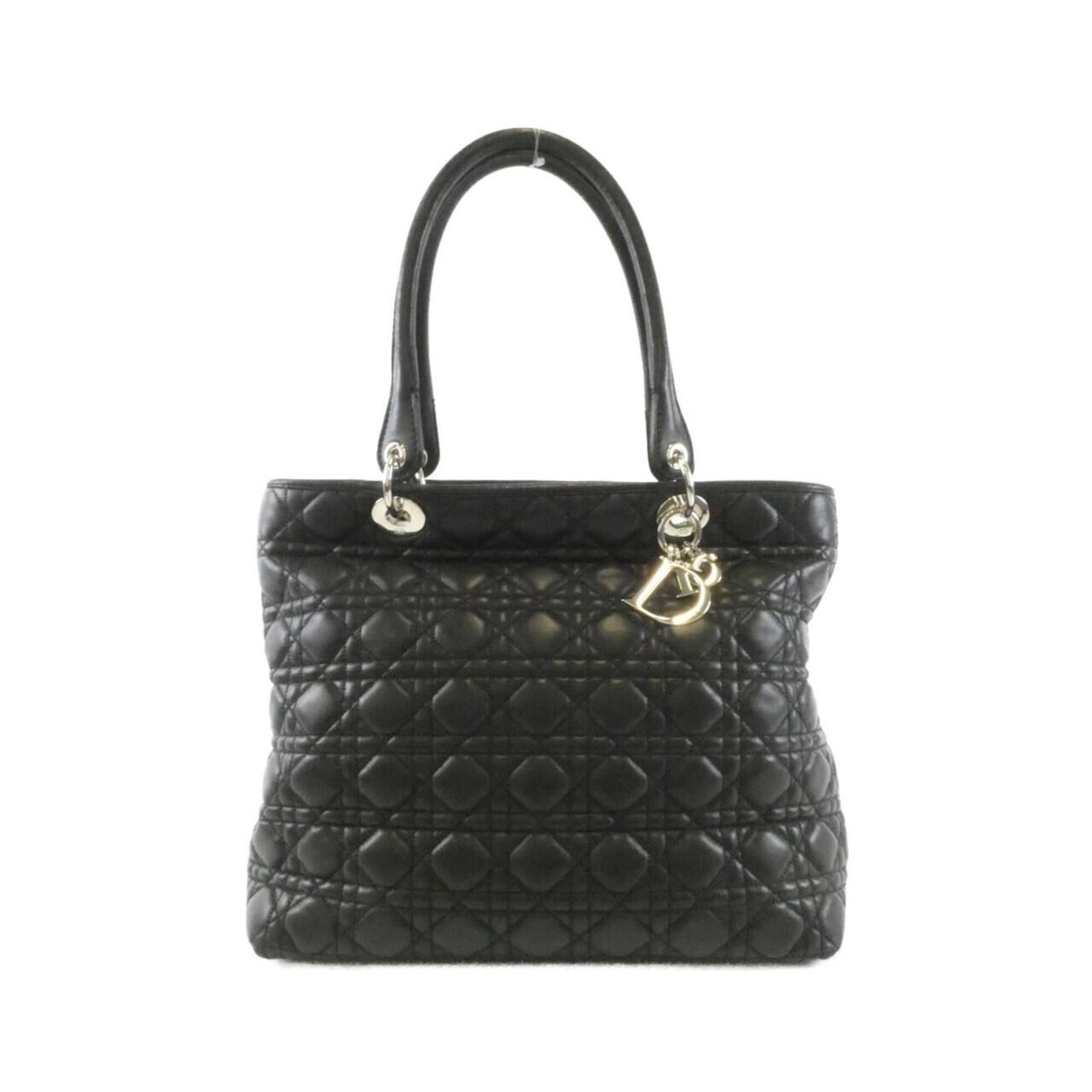 Handbag Christian Dior Leather: Handbag Christian Dior Leather Black leather handbag from Christian Dior, featuring silver hardware and a sleek design. Measuring 28cm x 31cm x 14cm, it offers a stylish and compact option for