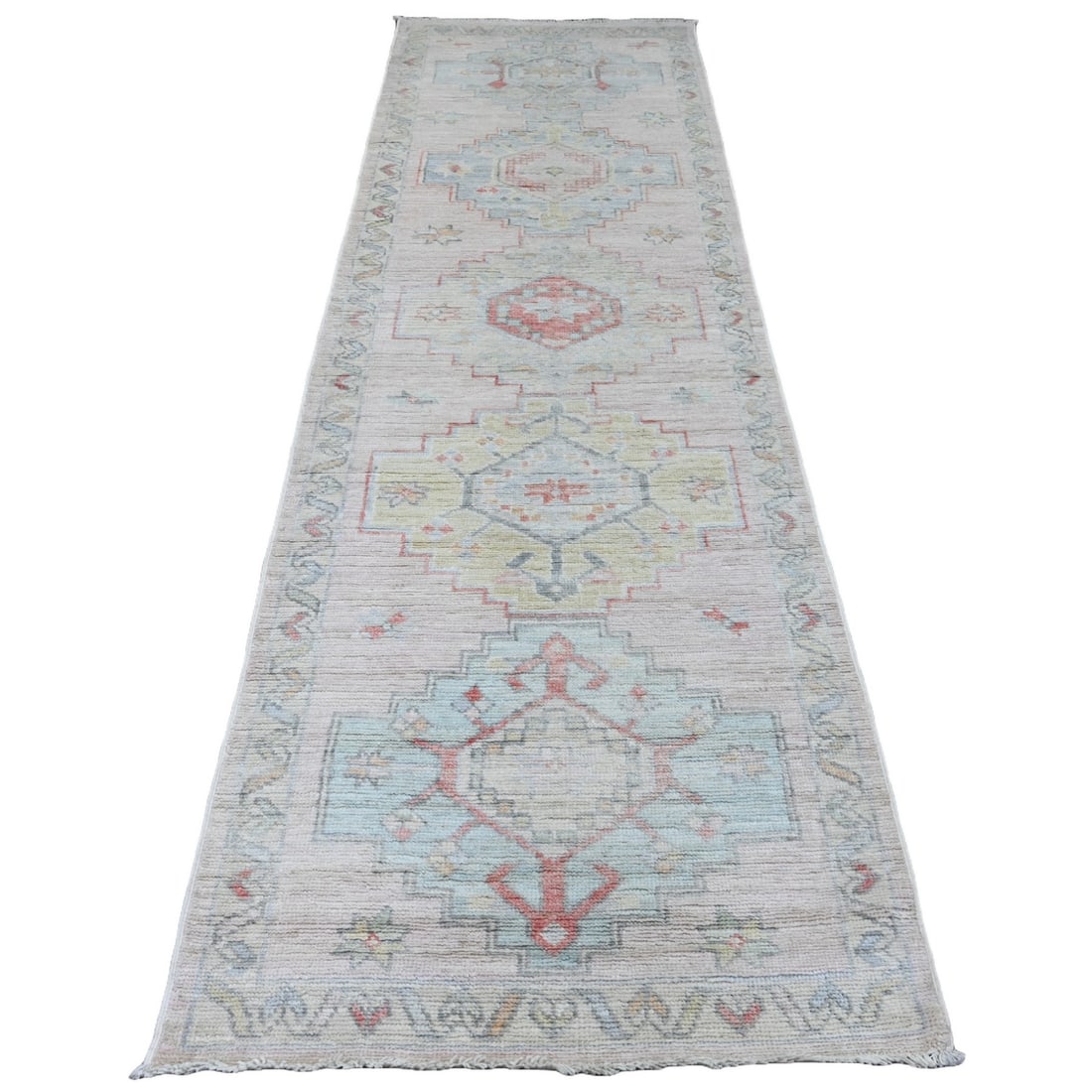 3'1"x10' Pink Anatolian Village Inspired All Wool Hand Knotted Runner Rug: 3'1"x10' Pink Anatolian Village Inspired All Wool Hand Knotted Runner Rug This stunning pink Anatolian-style all wool hand knotted runner rug boasts a vibrant geometric pattern, showcasing the region'