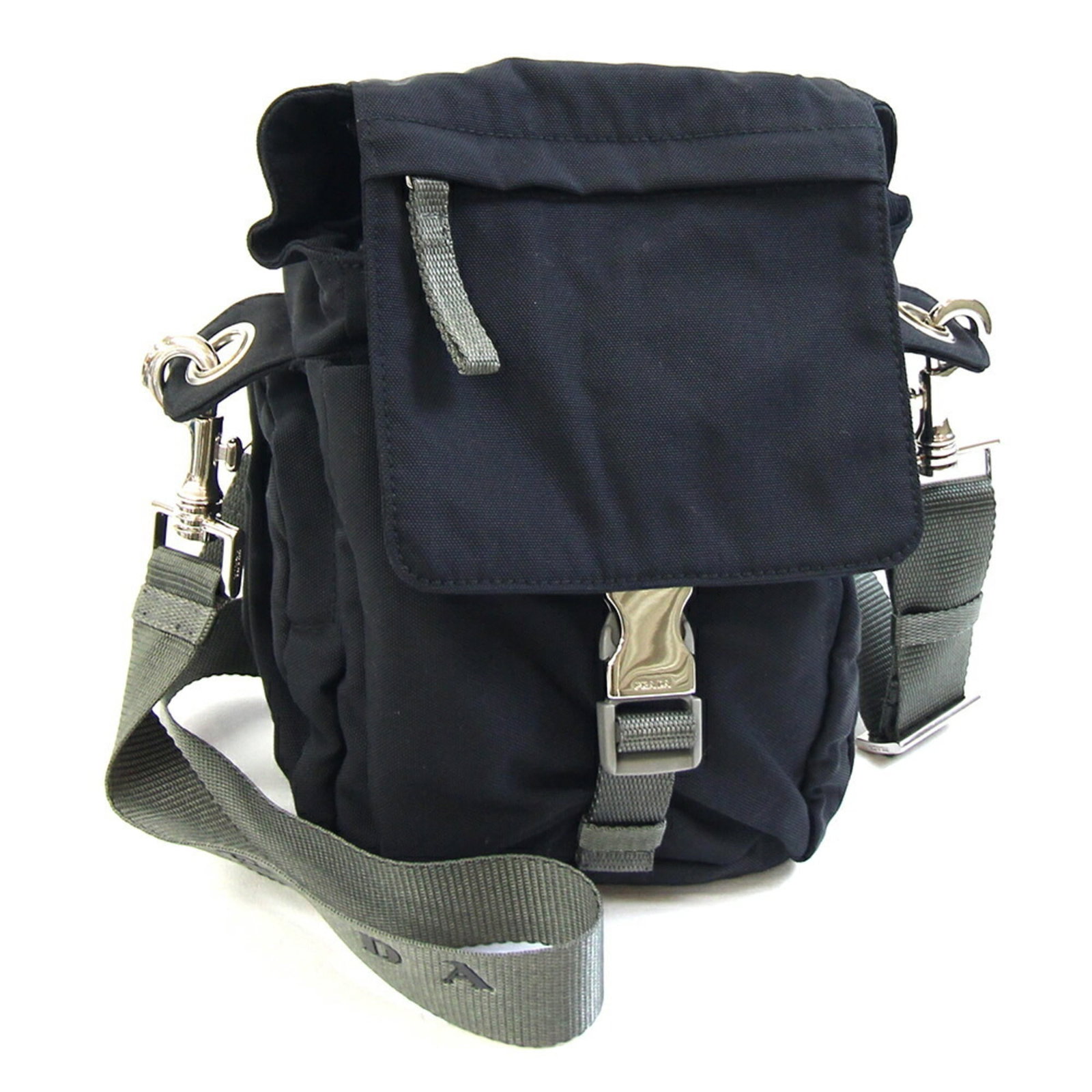 Pradasports Pochette Shoulder Bag Nylon Canvas: Pradasports Pochette Shoulder Bag Nylon Canvas Pradasports Pochette Shoulder Bag Nylon Canvas in Black, measuring 24cm x 14cm x 11cm. Made from durable nylon canvas, this stylish shoulder bag features