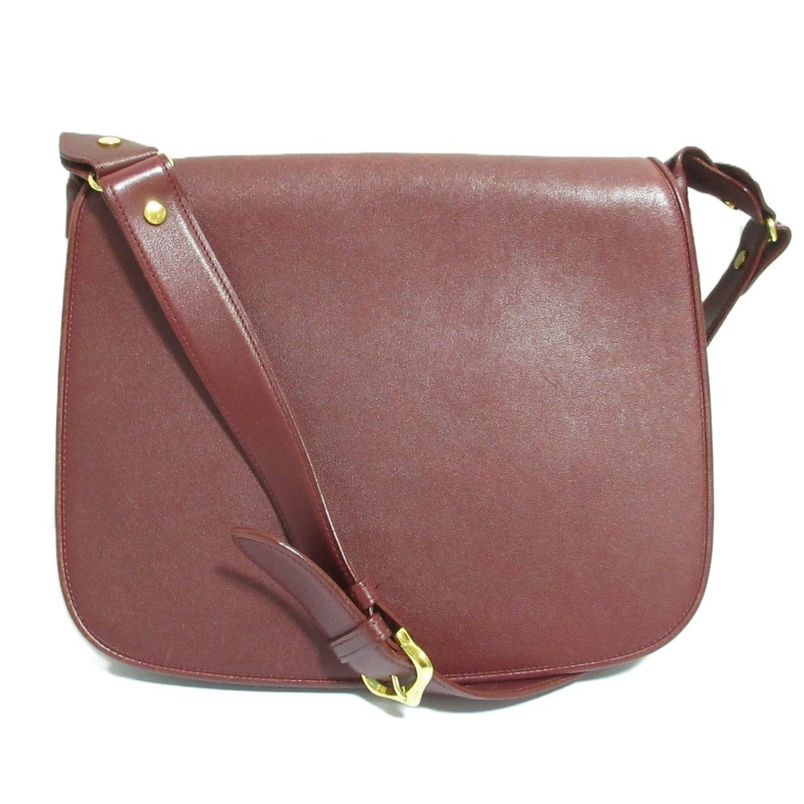Shoulder Bag Leather by Cartier: Shoulder Bag Leather by Cartier Cartier's Bordeaux leather shoulder bag boasts sleek lines and a sophisticated design, with its 22cm x 28cm x 3cm dimensions providing ample space for daily