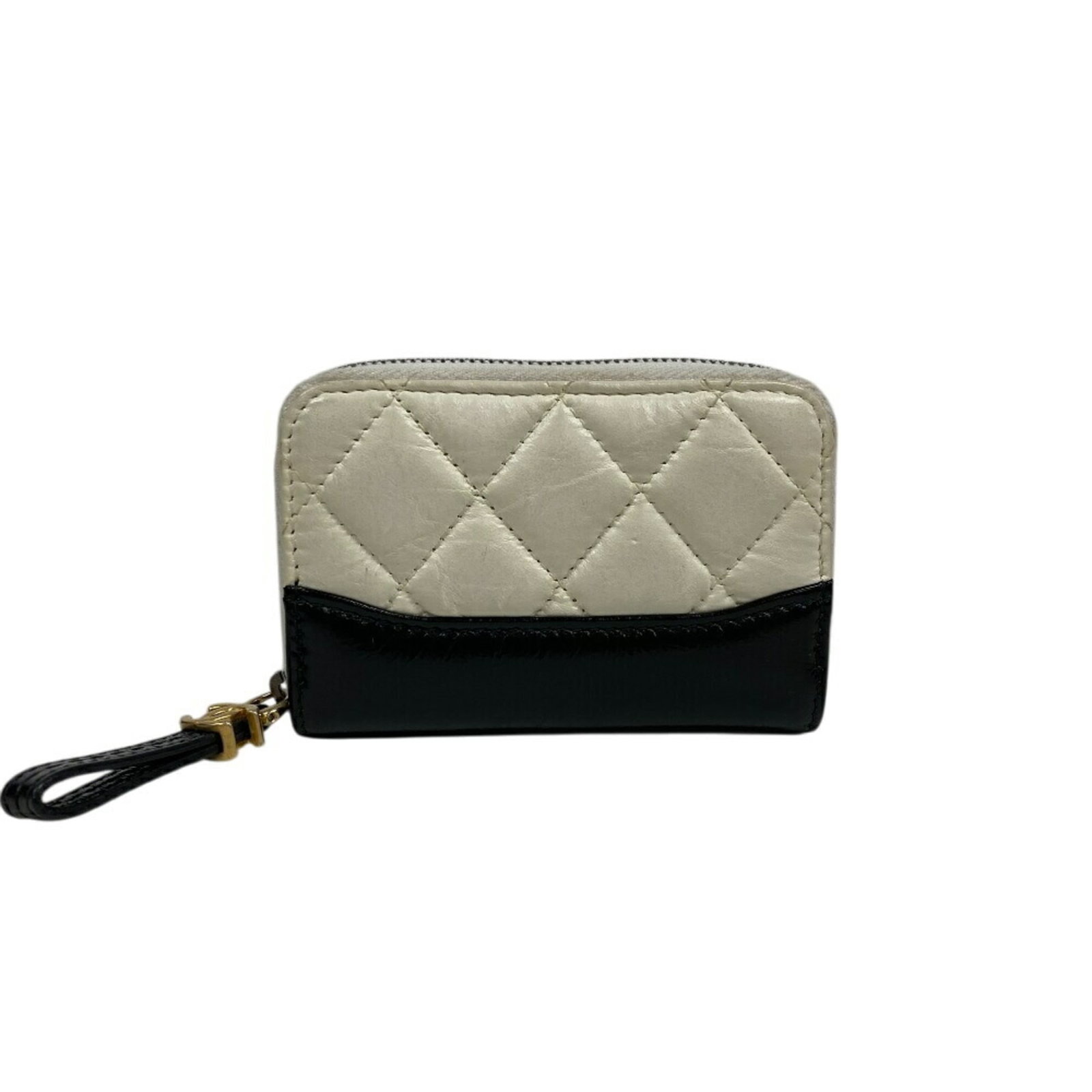Chanel Coin Purse/ Coin Case Leather: Chanel Coin Purse/ Coin Case Leather The Chanel Coin Purse/ Coin Case Leather is a sleek and sophisticated accessory, crafted from high-quality black leather. Featuring a classic design with a sturdy 