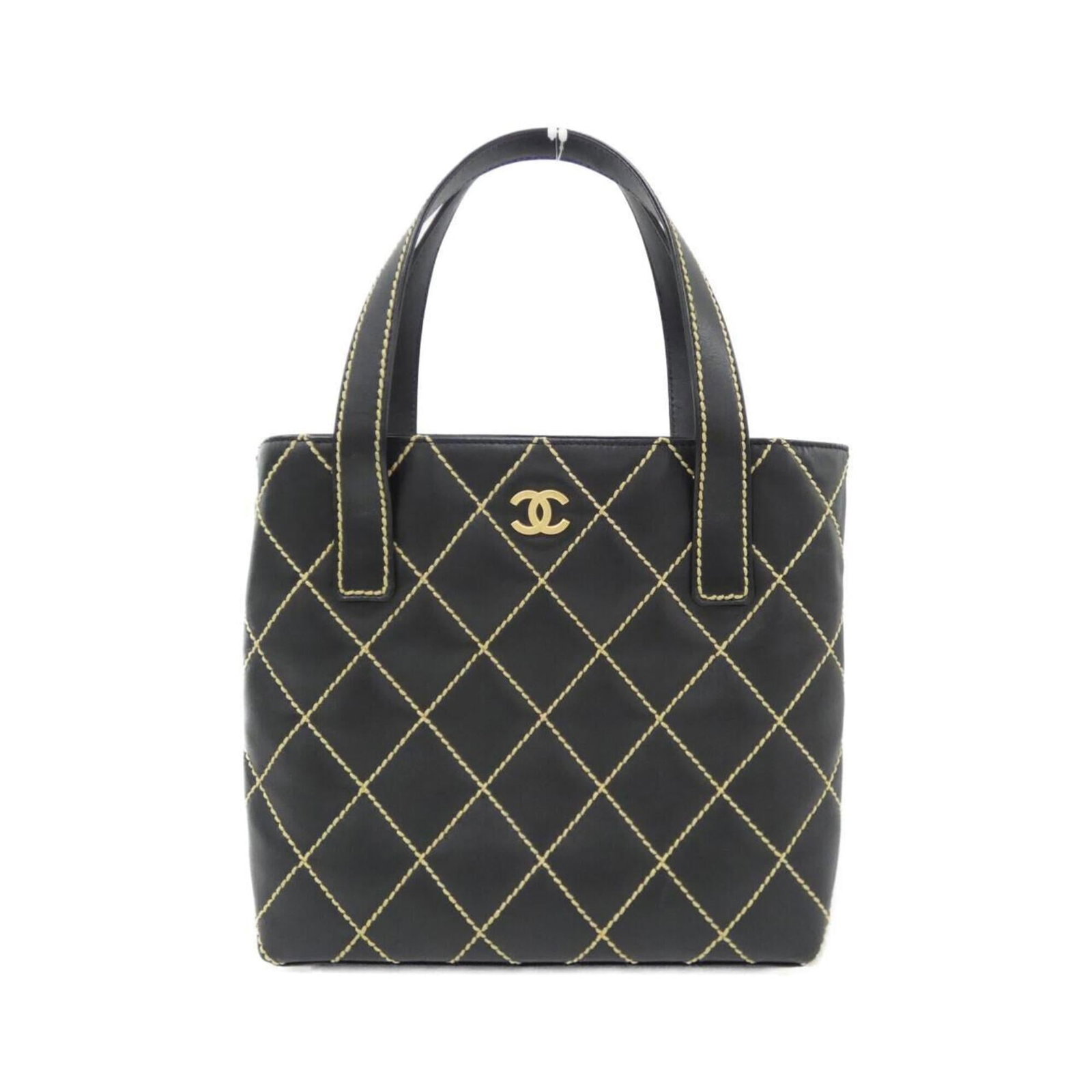 Chanel Handbag leather: Chanel Handbag leather Calfskin leather construction, characteristic of Chanel's signature style. This beige and black handbag features matte gold hardware, adding a touch of sophistication to its cla