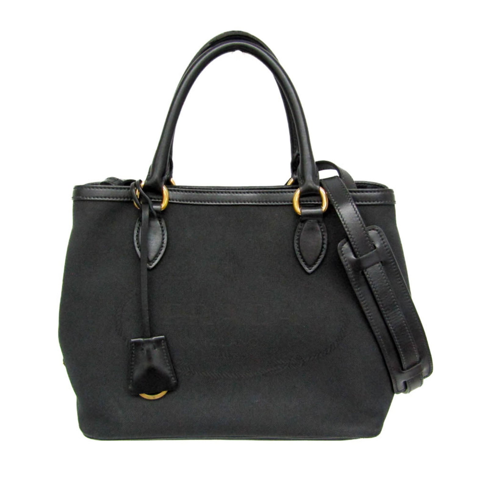 Handbag leather jacquard shoulder bag by Prada: Handbag leather jacquard shoulder bag by Prada Black leather jacquard shoulder bag by Prada, featuring magnetic snap closure and an open pocket for added convenience. The bag's sleek design and durabl