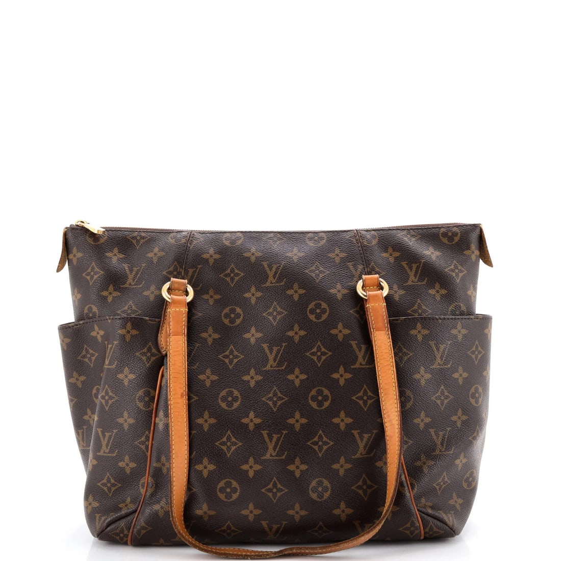 Totally Louis Vuitton Canvas Monogram Handbag MM: Totally Louis Vuitton Canvas Monogram Handbag MM Totally Louis Vuitton Canvas Monogram Handbag MM features a classic brown canvas exterior with gold hardware, showcasing the iconic monogram pattern. M