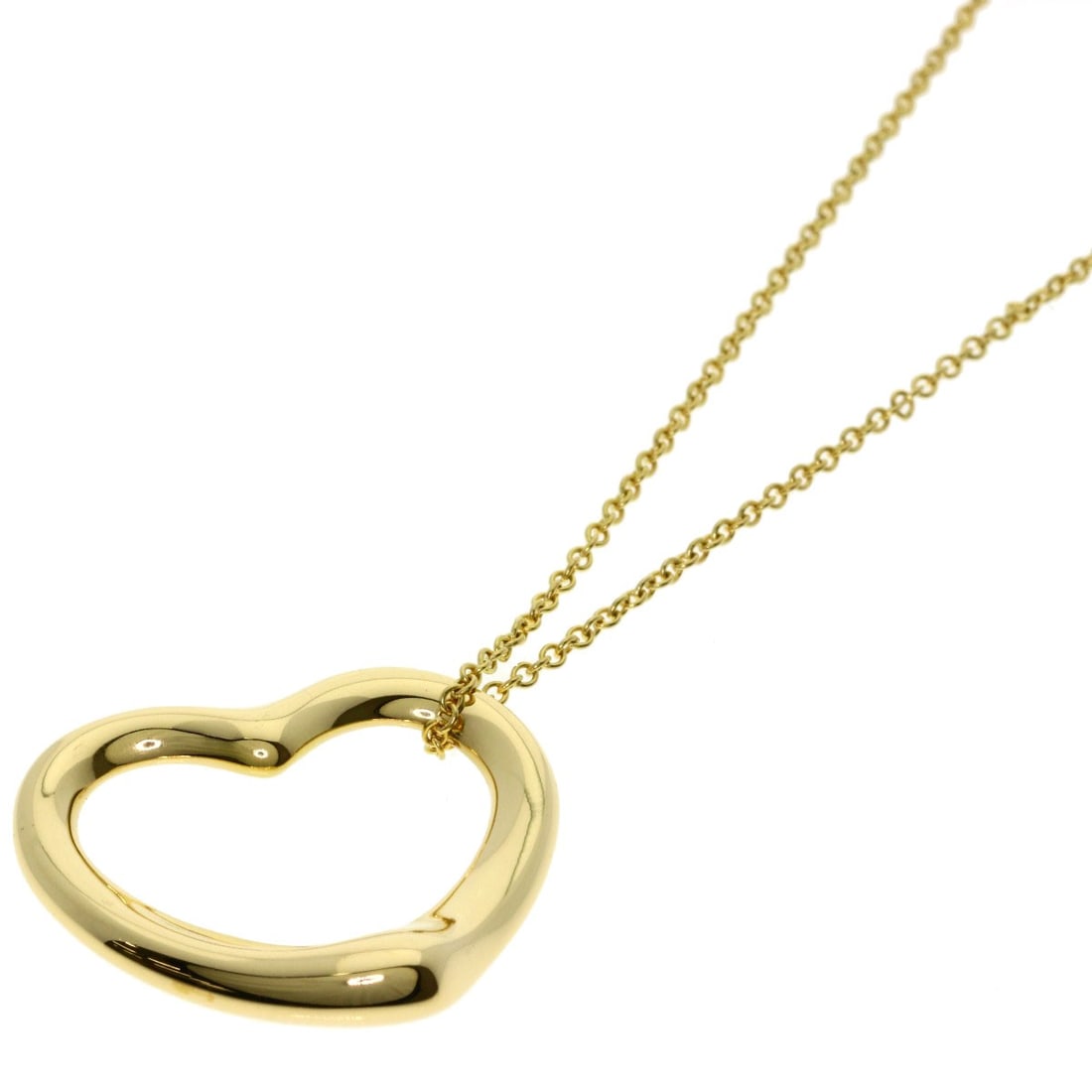 Yellow gold necklace open heart Tiffany Co: Yellow gold necklace open heart Tiffany Co K18 yellow gold necklace with an open heart design, crafted by Tiffany & Co. in a striking gold hue. This elegant piece boasts a length of 16.1 inches, showc