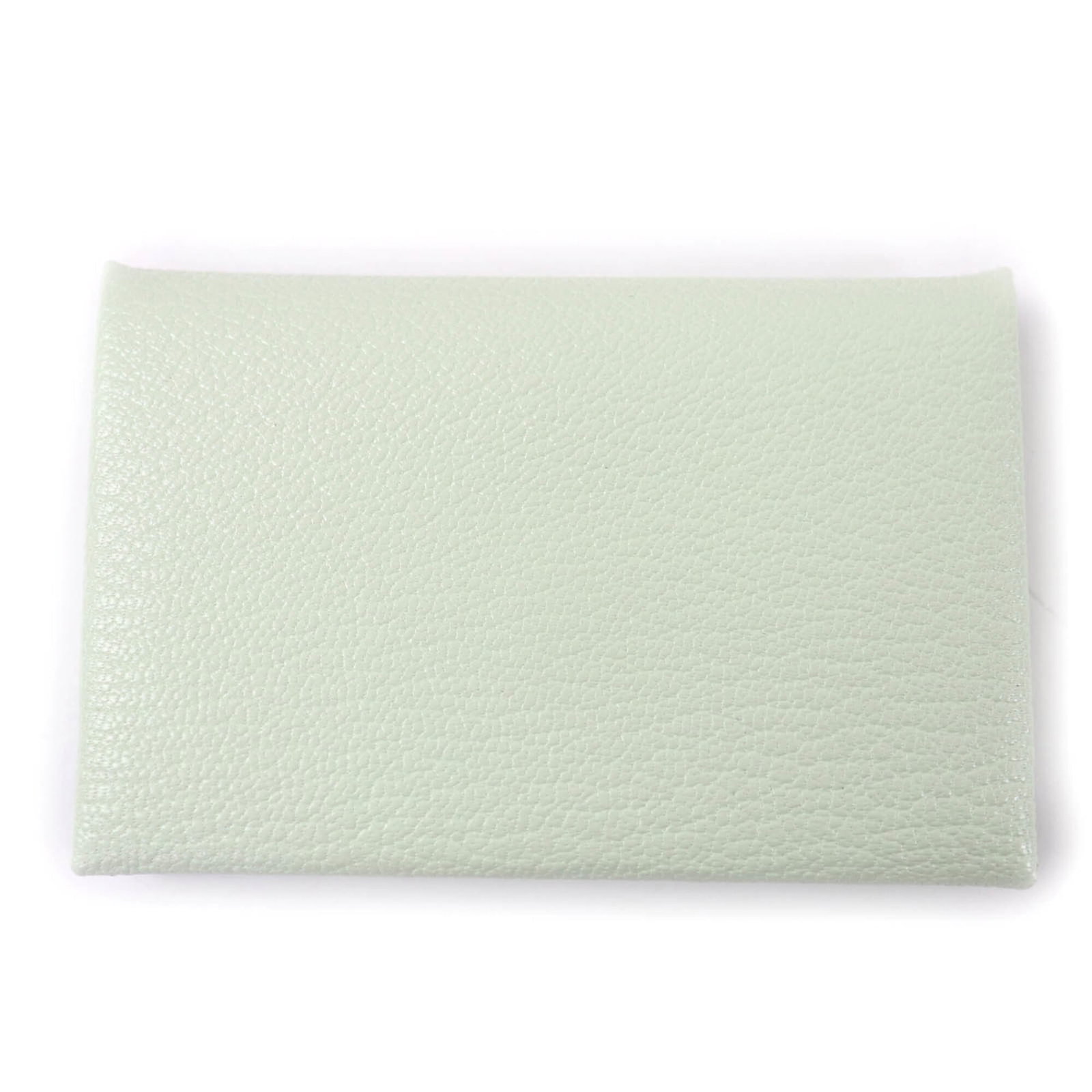 Chevre Leather Travel Pass Case by Hermes: Chevre Leather Travel Pass Case by Hermes Chevre leather provides a unique texture and subtle sheen to this mint green travel pass case, crafted by the renowned French brand Hermes. The compact size a