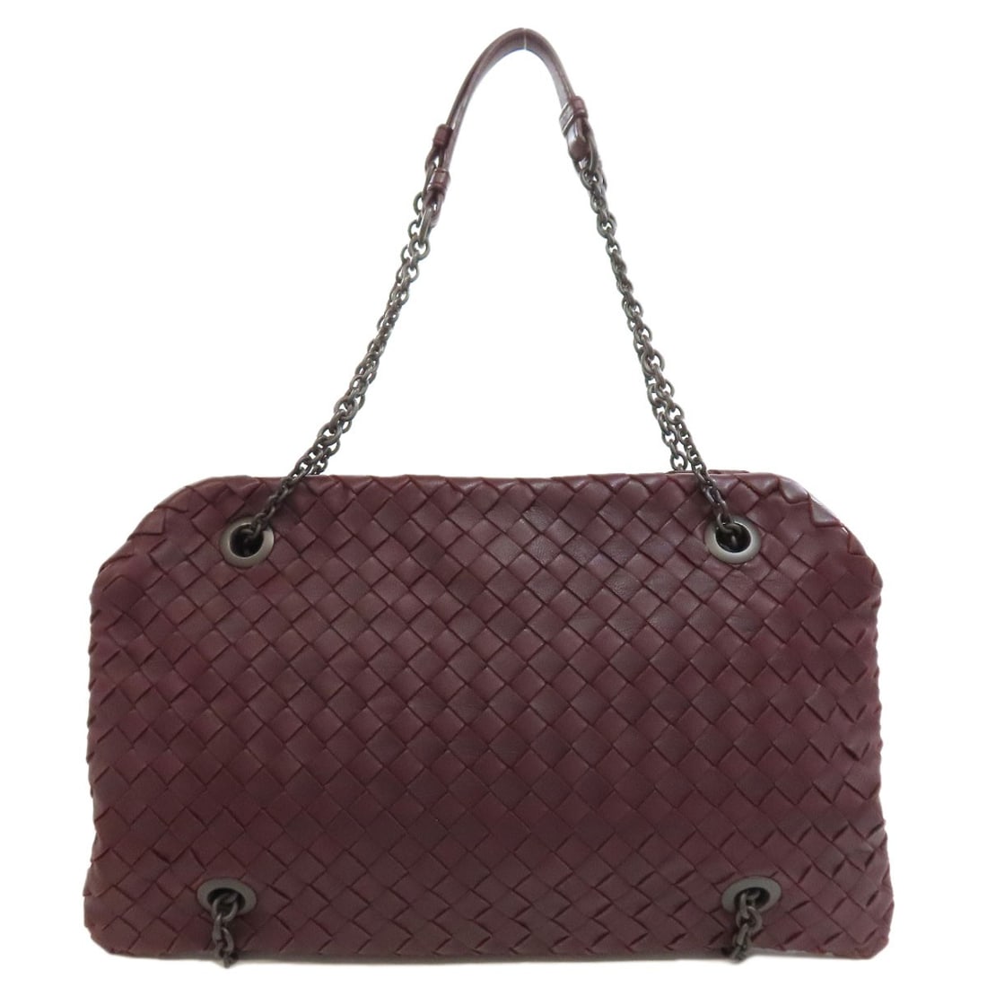 Veneta Intrecciato Handbag Calf: Veneta Intrecciato Handbag Calf Red Calf Veneta Intrecciato Handbag. This handbag features the iconic Veneta Intrecciato weave, crafted from high-quality calf leather in a striking red hue. The classi