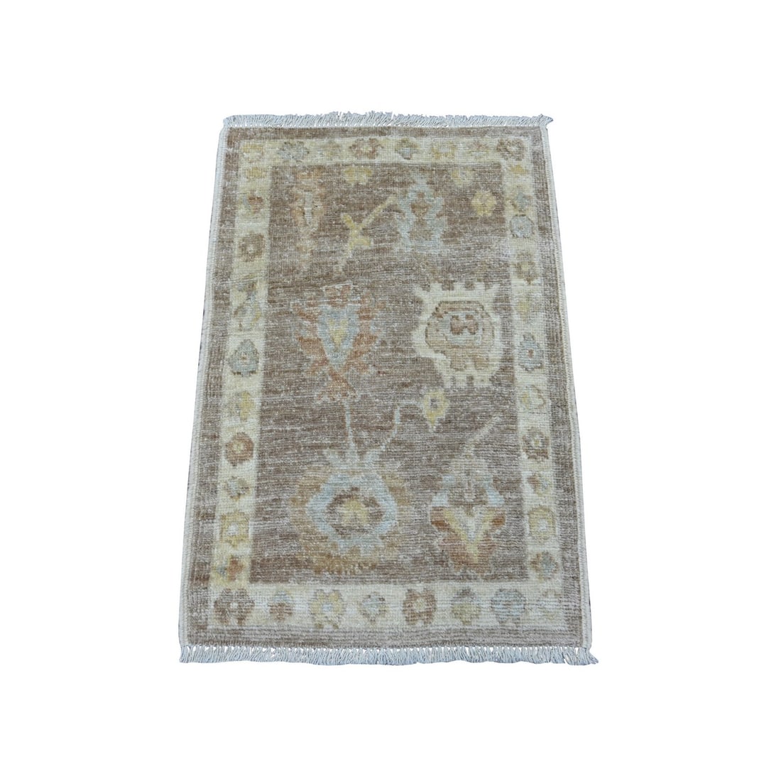 2'x3' Cedar Brown Hand Knotted Wool Afghan Angora Oushak Mat Oriental Rug: 2'x3' Cedar Brown Hand Knotted Wool Afghan Angora Oushak Mat Oriental Rug The Oushak mat boasts an intricate floral pattern in rich brown hues, set against a subtle background. Hand-knotted with high-