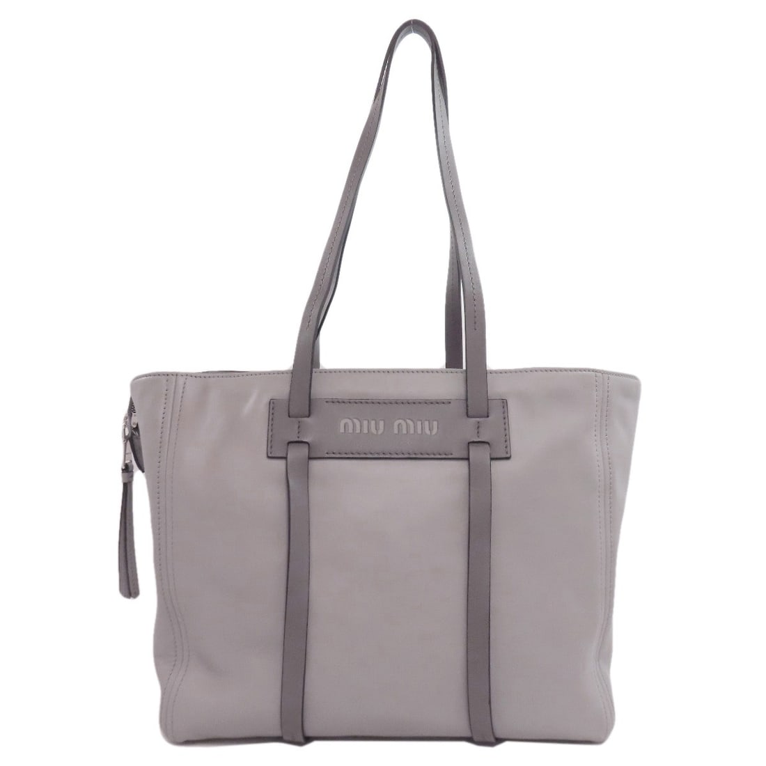Logo tote bag leather Miumiu: Logo tote bag leather Miumiu Gray leather tote bag from MIUMIU, featuring a classic design with a high-quality exterior material. The bag's simple yet stylish gray color makes it a versatile accessory