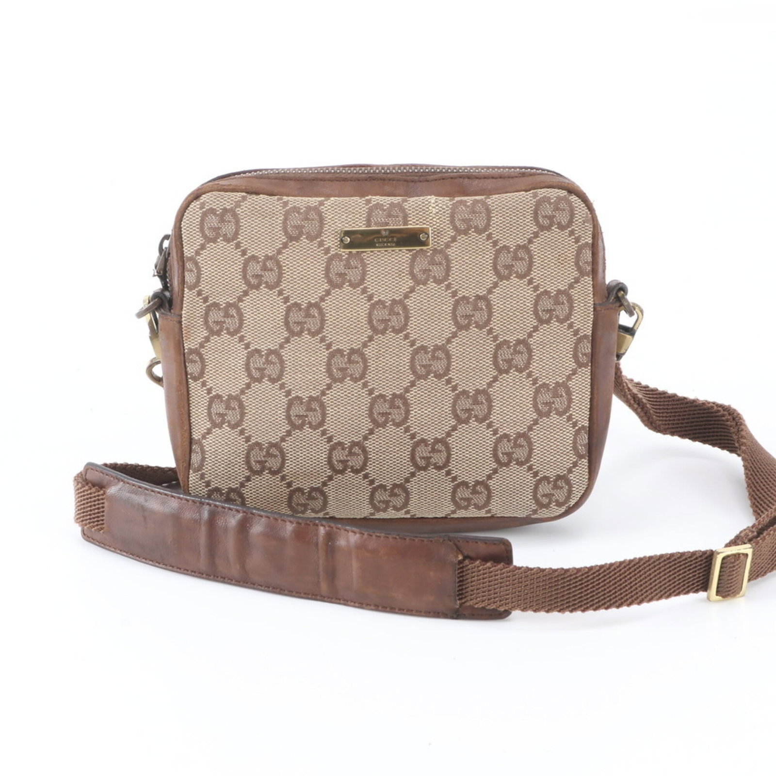 Canvas bag Gucci shoulder: Canvas bag Gucci shoulder Gucci canvas shoulder bag with classic GG design, featuring brown color and signature logo. Made from high-quality GG canvas material, this stylish bag measures 12cm x 15cm x